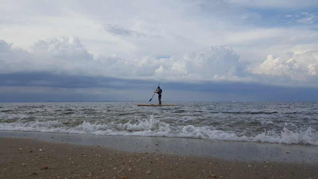 The other Oscar in my paddling life - a volunteer at Hoboken Cove - tempting the great white sharks of Sandy Hook! (Photo courtesy of Kirsten Brink)