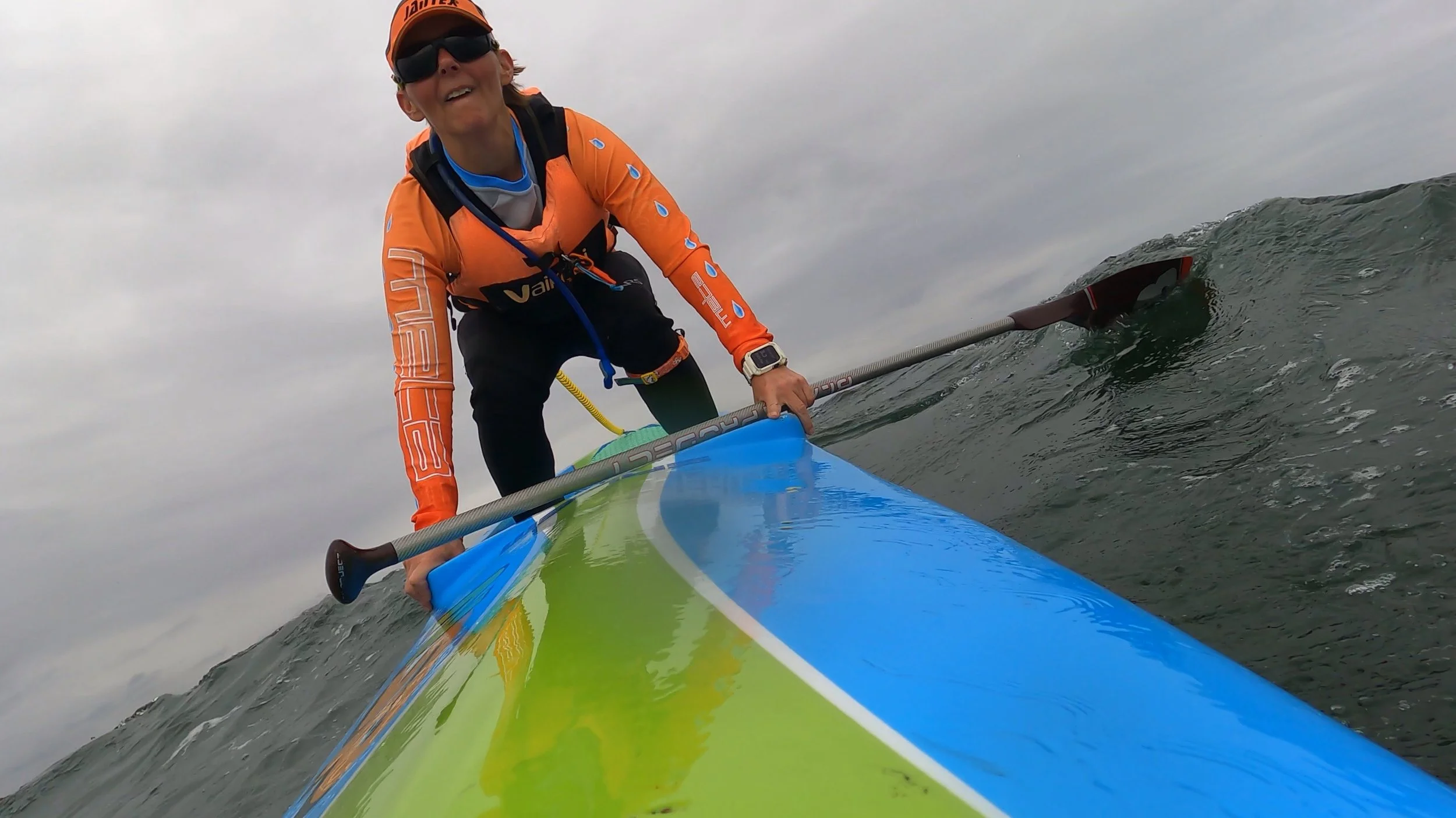 paddle shirt orange meta leash SUP.JPG