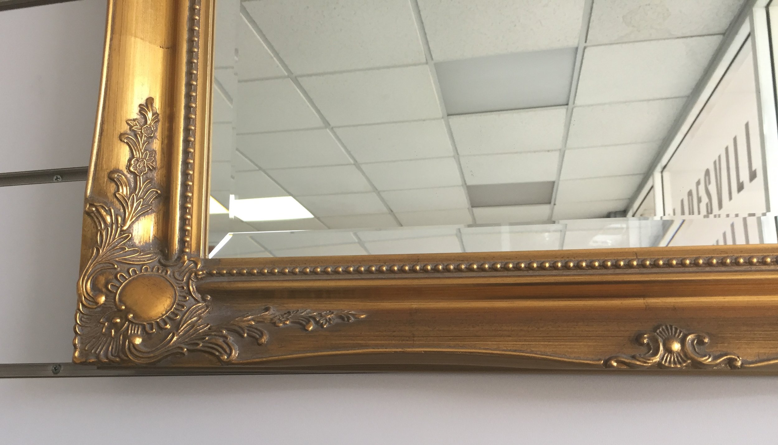 Gold Ornate framed bevelled mirror Close Up.jpg
