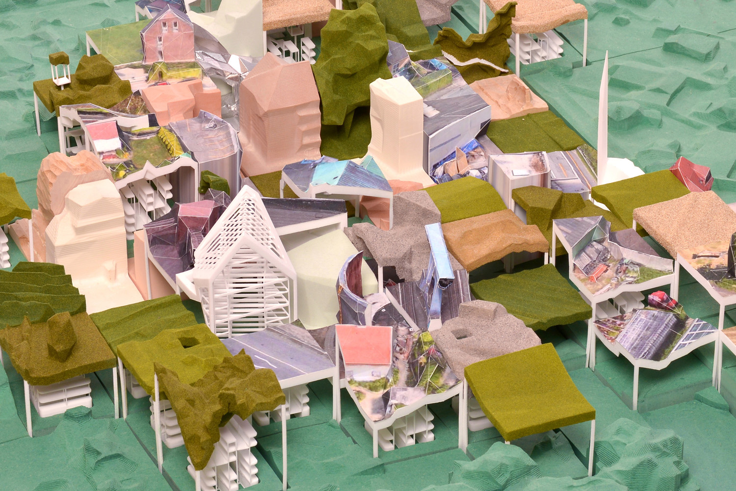 Low Res City – The Phygital Warehouse, Y5. Tutors: Prof. Laura Allen and Prof. Mark Smout . A large scale model of 'Low Res City' served as testbed to celebrate and evaluate existing and novel ways of fabrication. Using photogrammetry on screenshots allowed me to obtain low-resolution pointclouds of the whole city. Pinpointing where to 'grab' data, the intersections of a coordinate grid overlaying the city perimeter limited my agency as curator. Bit by bit a compressed image of Hamburg got physicalised, using newly developed techniques – Augmented Carving and Papercasting –, paired with established digital fabrication technologies, such as robotic milling and 3D-printing. Challenged by the recomposition of mined and and physicalised specimens, Low Res City forms a provocation towards the image of the city: grabbed from the sky, can a shed in the backgarden, a street corner, a field of crops become truer representatives of the city fabric and its phygital moments?