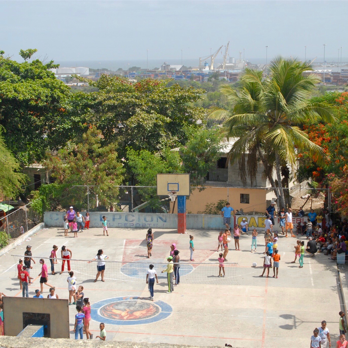 Sports ministry is a key component of work in the port city of Haina. This court is across the street from El Refugio, our partner church.
