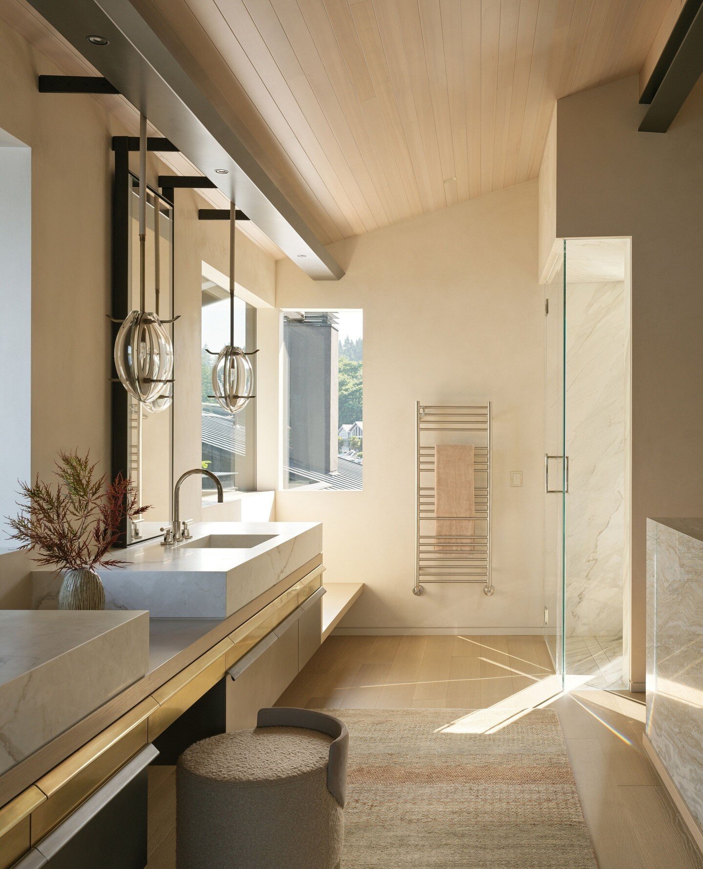 Designed with function at your fingertips this elegant bathroom remodel plays with natural light and sumptuous materials. Thanks to @k7scott for capturing the light and @okanopicardstudio for architectural and interior design collaboration.⁠
⁠
⁠
⁠
⁠
