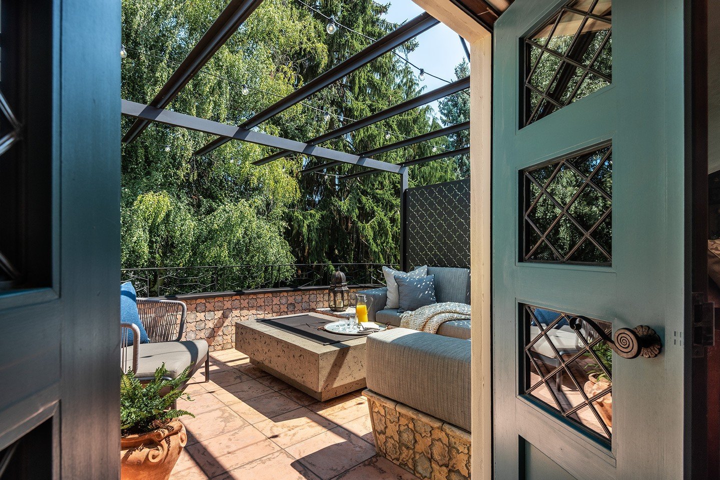 For this immaculate 1940s-era Spanish Colonial home, we transformed the Juliet balcony off the primary suite into an outdoor oasis using materials that could withstand the wet, freeze-thaw cycles of Seattle&rsquo;s climate while developing a rich pat