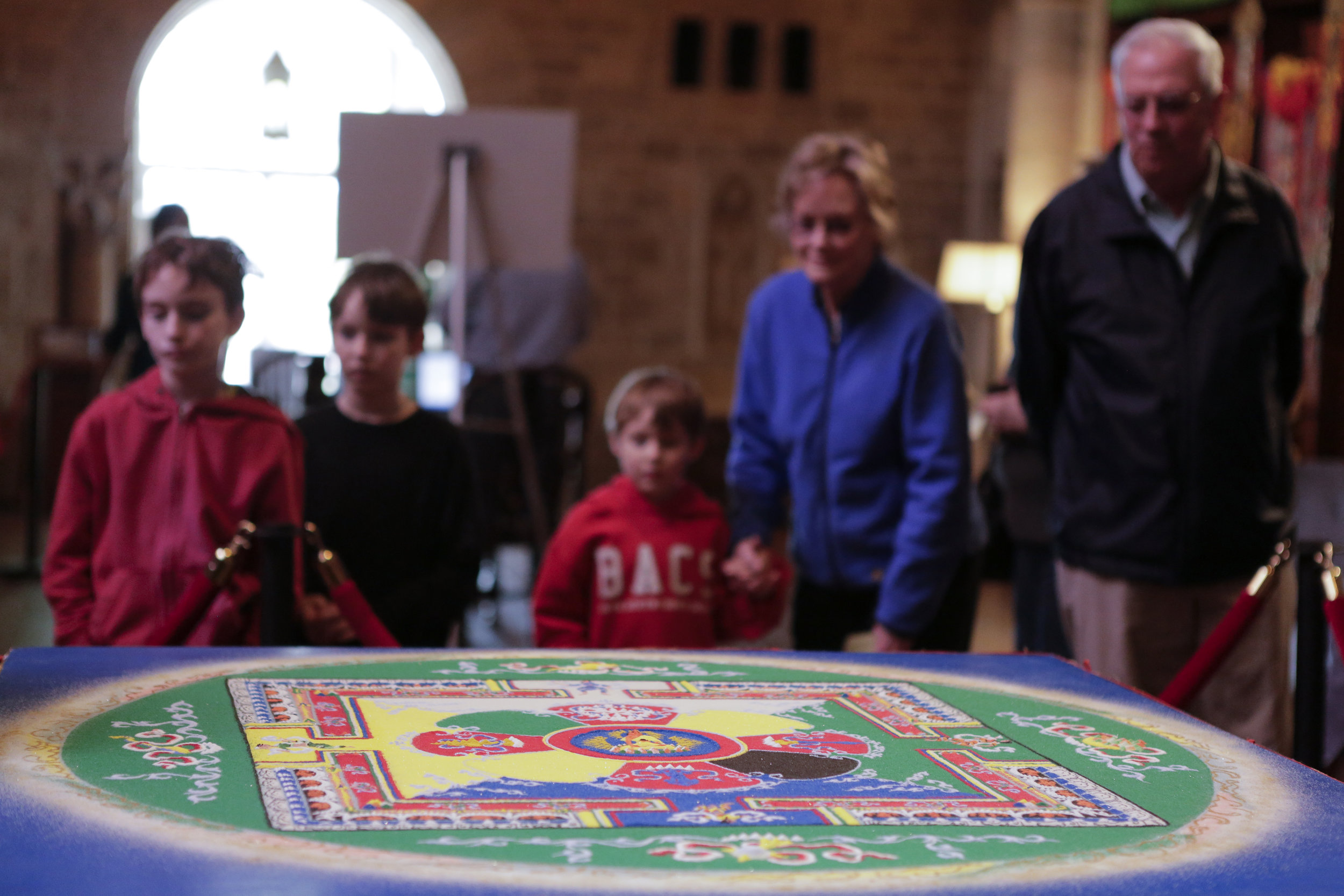  Visitors enjoying a sand mandala at Glencairn Museum 