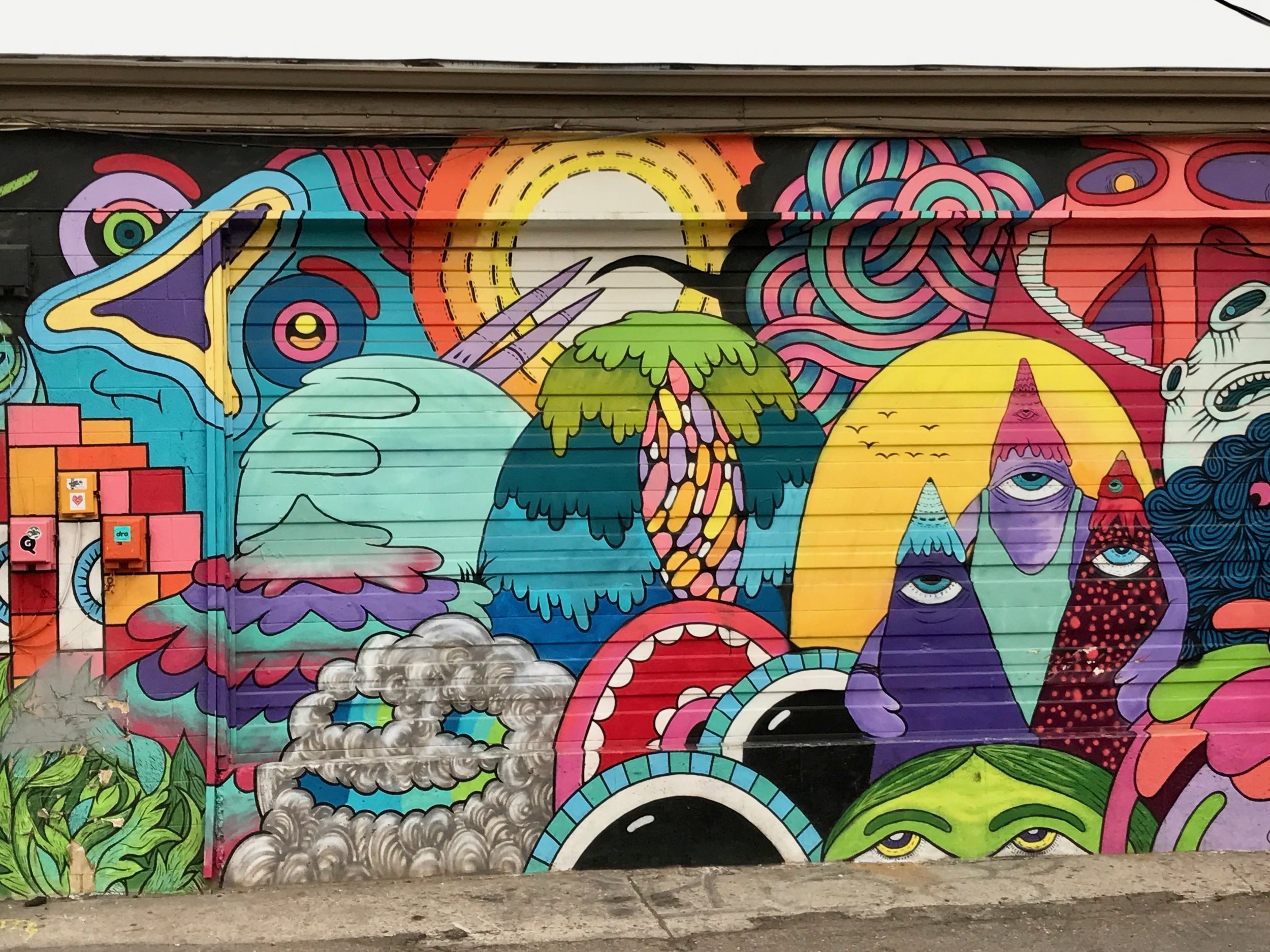 A mural by RUMTUM in Denver’s RiNo neighborhood.