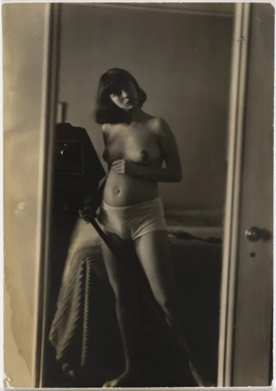 Diane Arbus, Self-portrait in mirror. 1945. The Audrey and Sydney Irmas Collection.