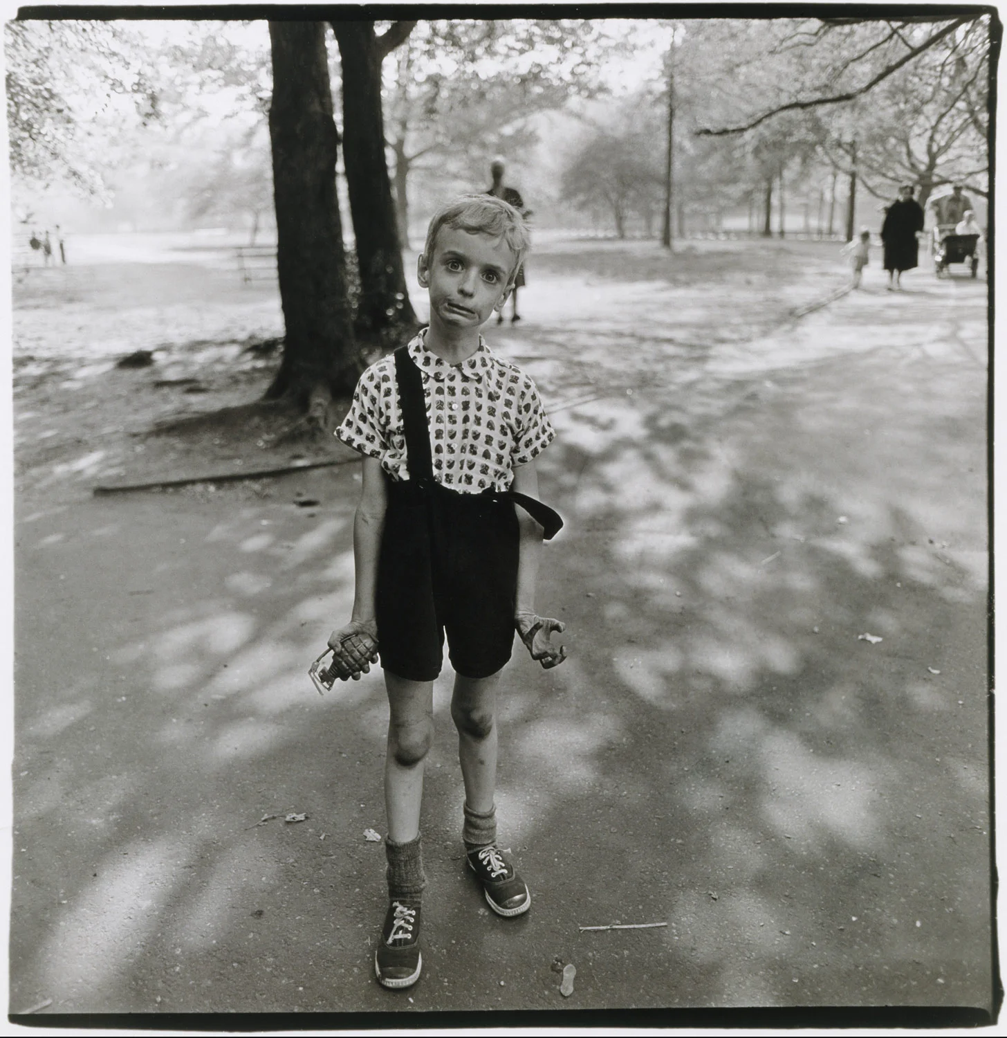 Diane Arbus, Child with toy hand grenade in Central Park, NYC, 1962