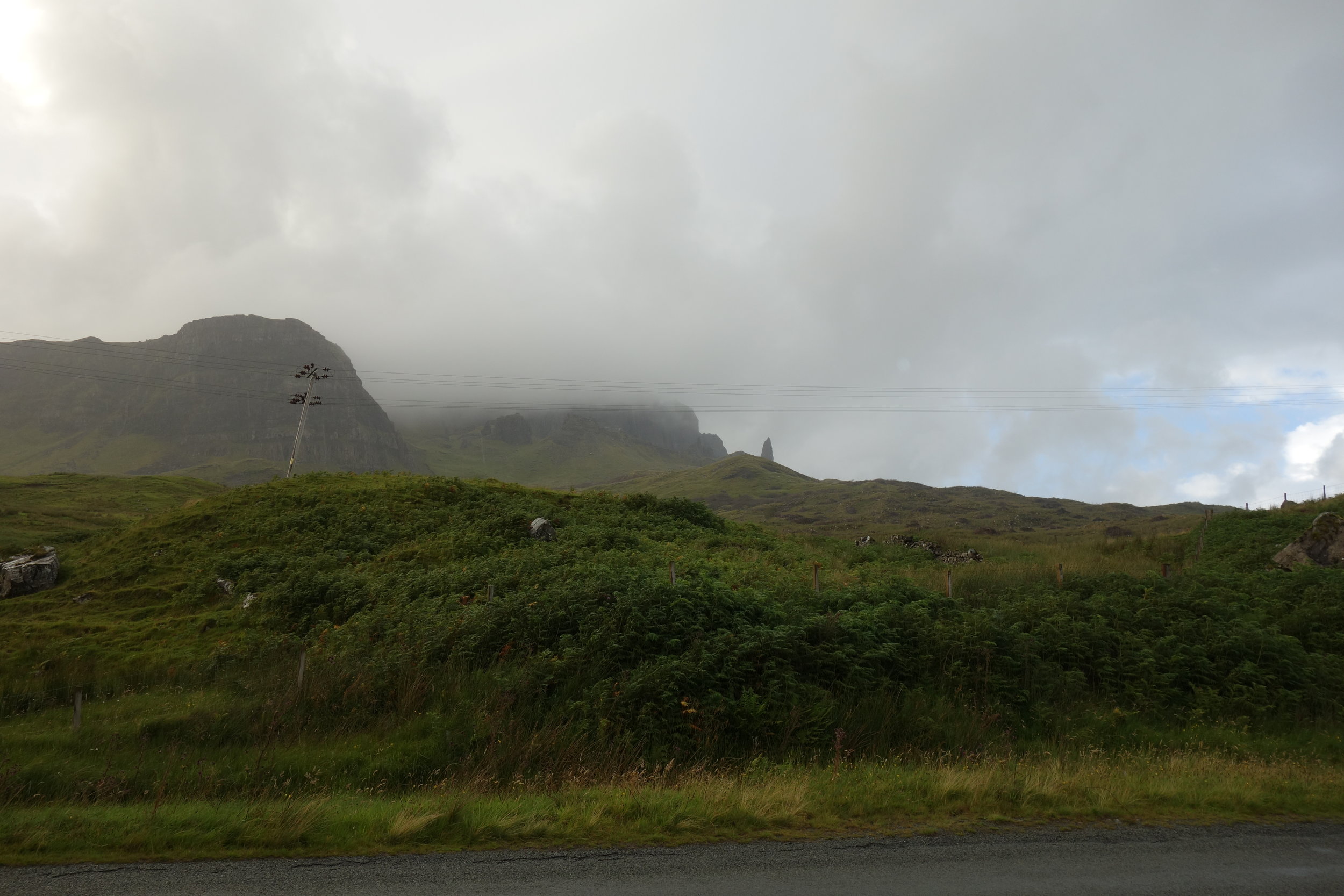 Behold: The Storr. It's the pointy rock thing in the distance. V. impressive, I know. Not picture: me, dying, taking this picture as proof that I made it before I passed out on the highway. Like a CHAMPION.