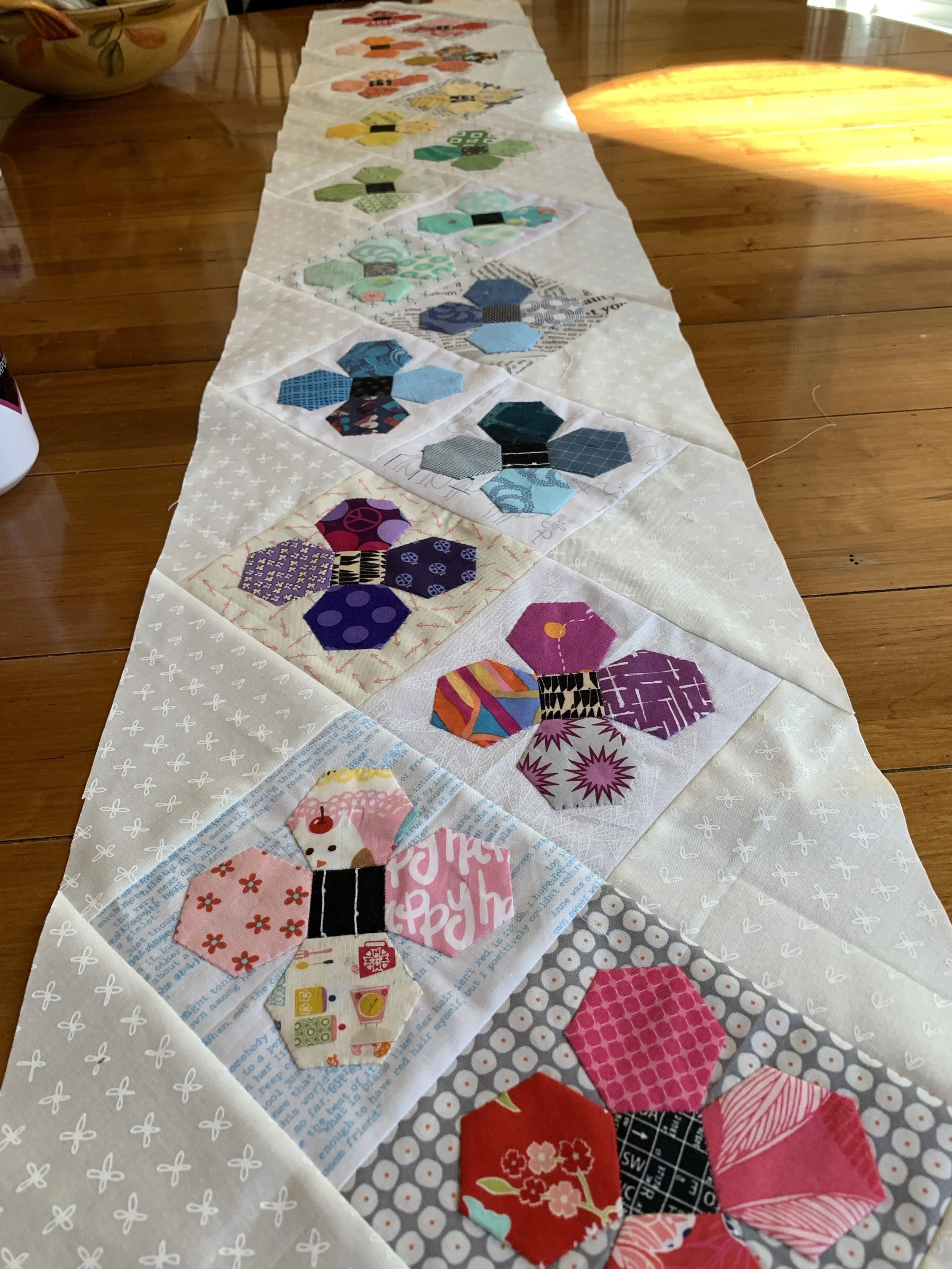 Scrappy Happy Flower EPP blocks on point