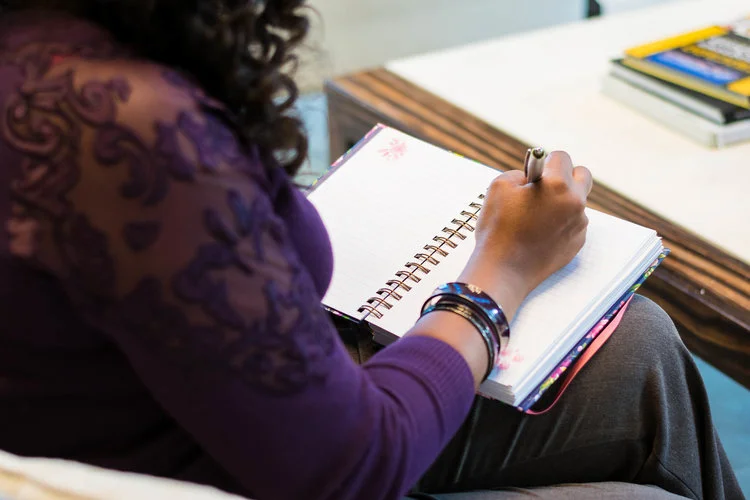 Uzoma Writing.jpg