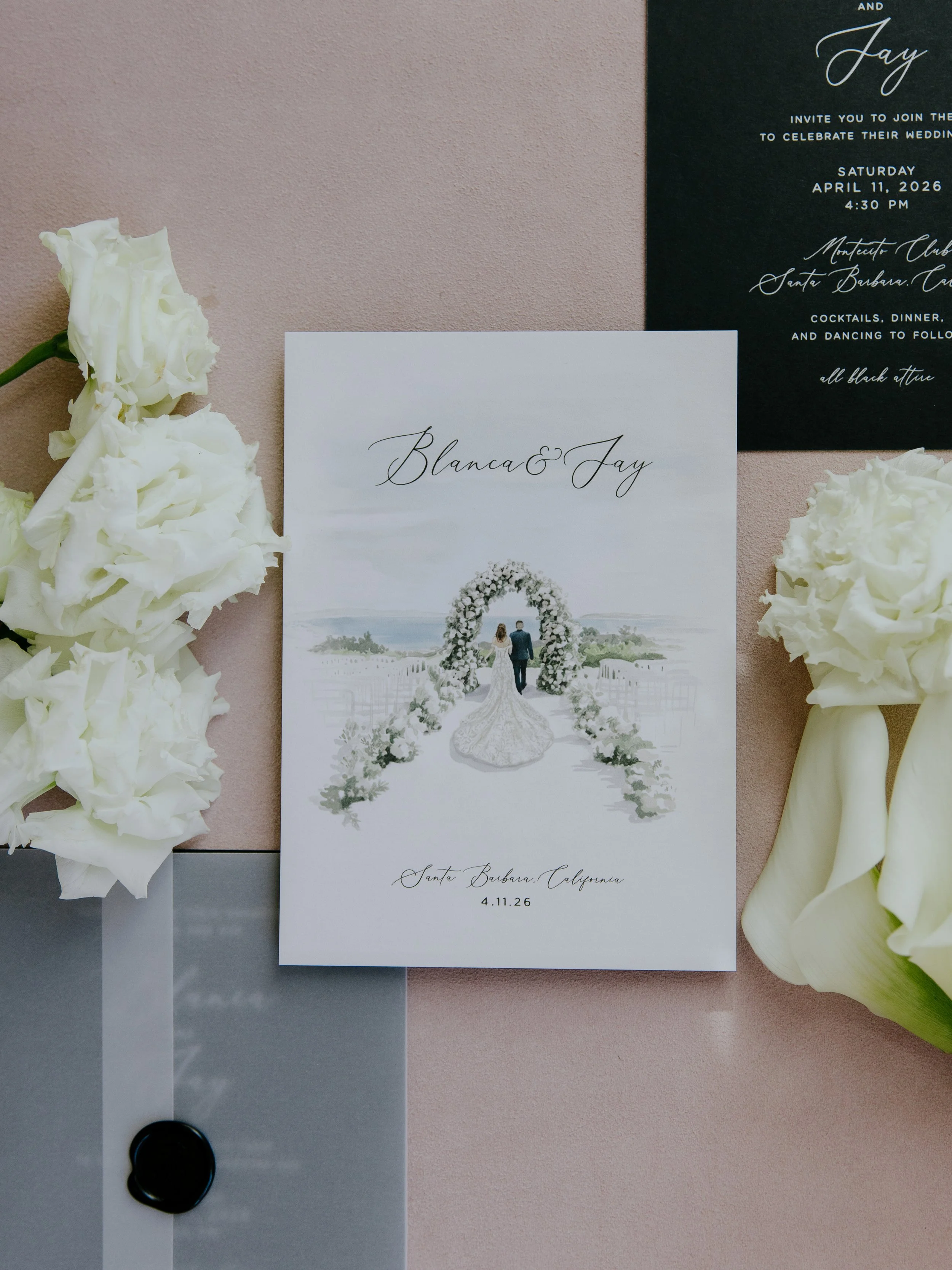 Sugar River Stationary invitation suite with a sketch of the bride in her gown beneath the ceremony arch, styled with white roses and calla lilies