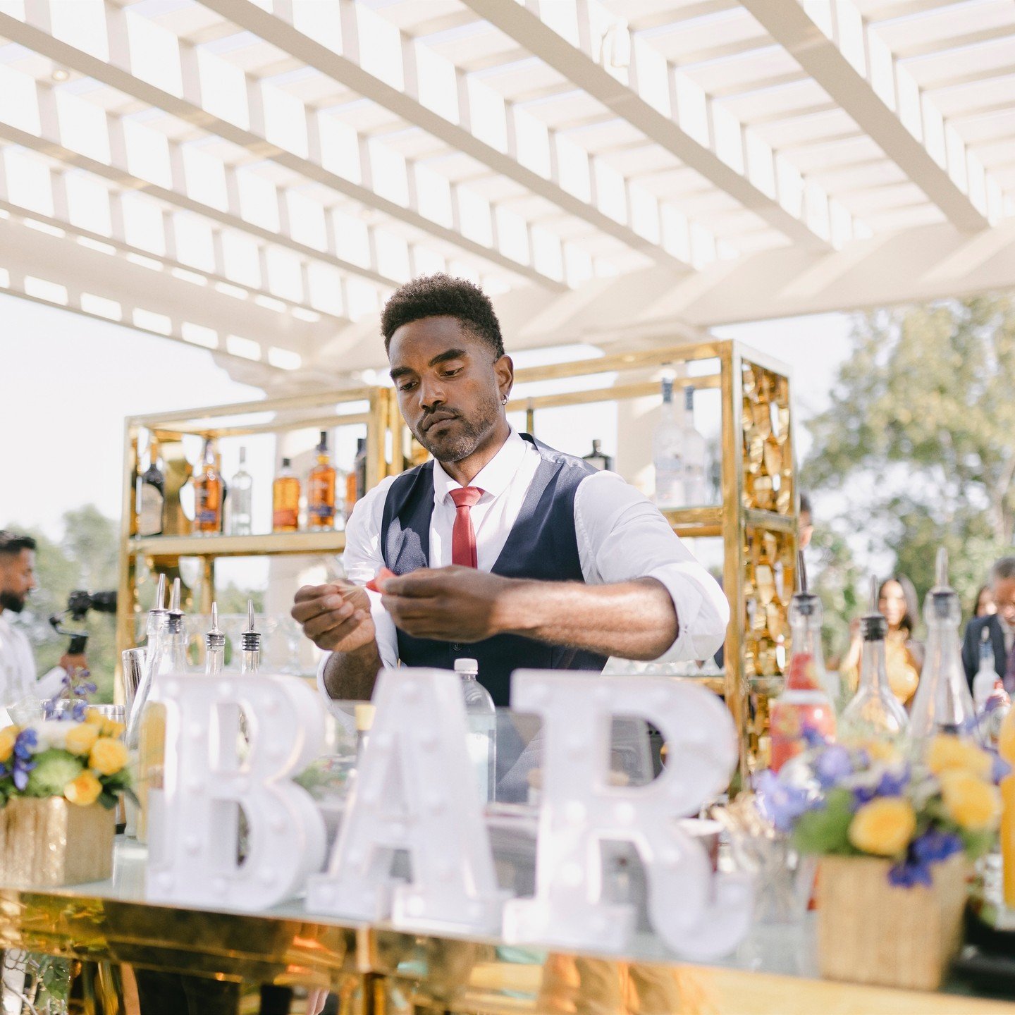 The Bar is the centerpiece of your party! Make it gorgeous and make it a hot spot. The key to a great party - Make sure you have plenty of bartenders to keep the fun flowing. I like to staff one bartender per 50 guests. There is no fun when you are i