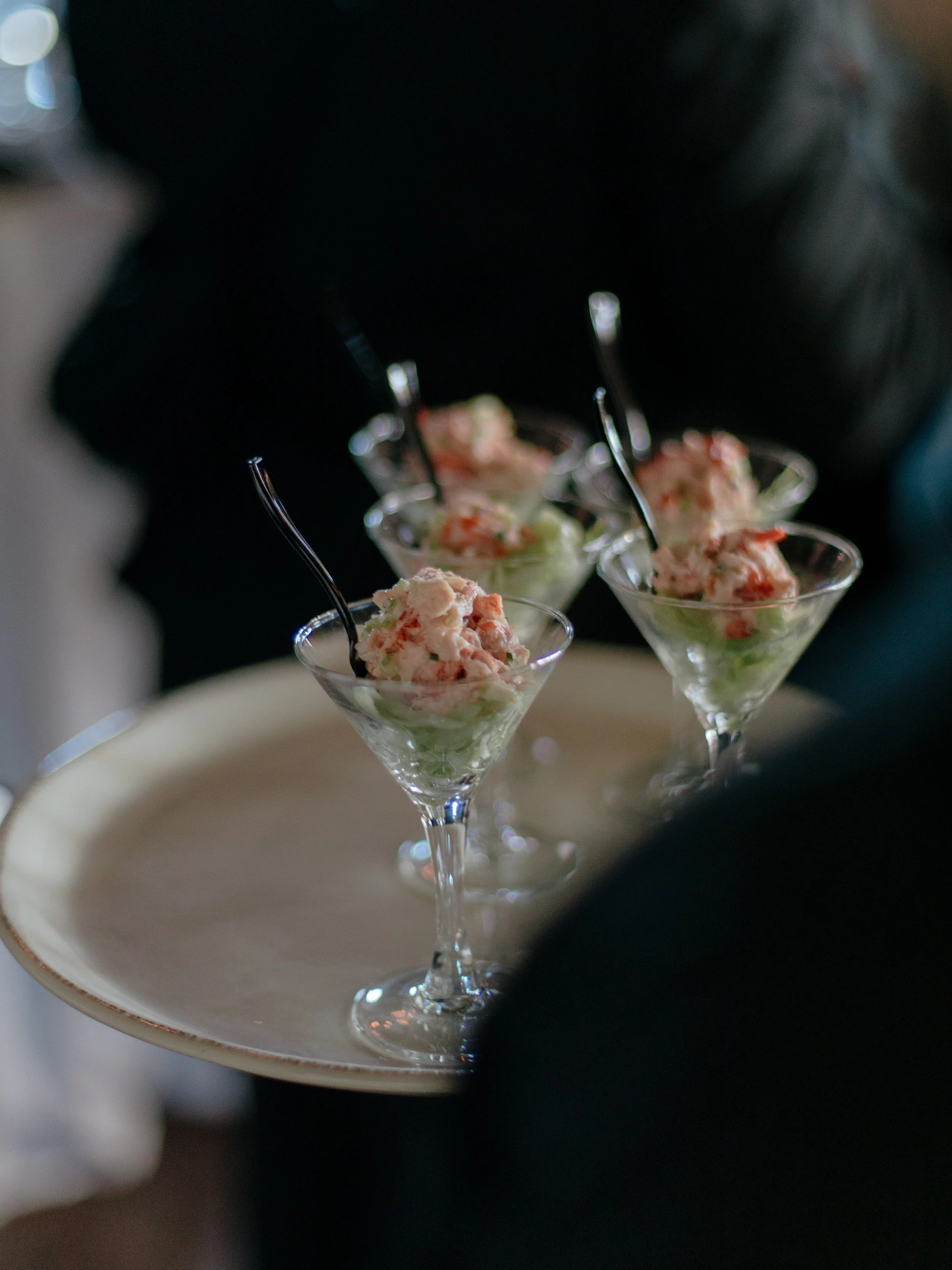 Passed appetizers served in martini glasses during cocktail hour