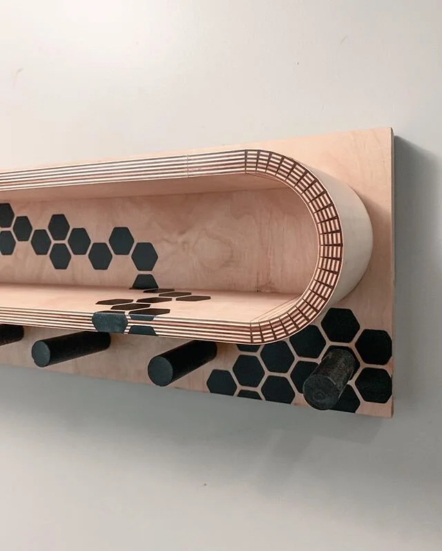 #moderncurvedplywoodshelf Here is a closer-ish up shot. I filled the kerfs with clear epoxy and sanded them all flush. You can not feel the kerfs or the cuts on the inside of the curve and this whole piece is very solid. I finished this by sanding to