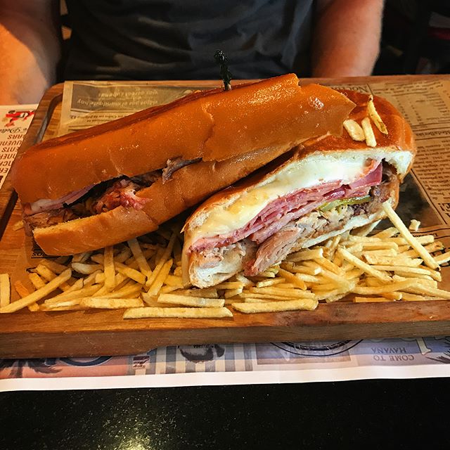 Cuban food for lunch while it thunderstorms two feet away, in a packed out restaurant with people singing and dancing to Latin music in competition with the sound of the rain. Miami I have missed you. #cubano #foodtour #foodofinstagram #yum