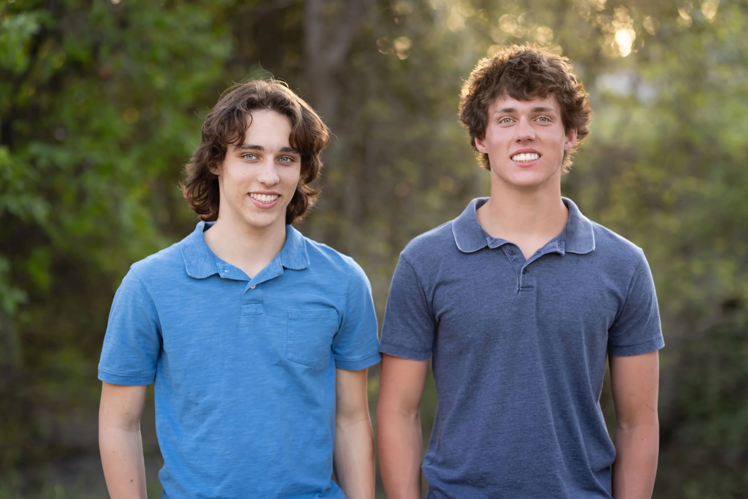Christian Brothers seniors and brothers stand shoulder to shoulder on the pathway in Royer Park in Roseville, California in the spring of 2026
