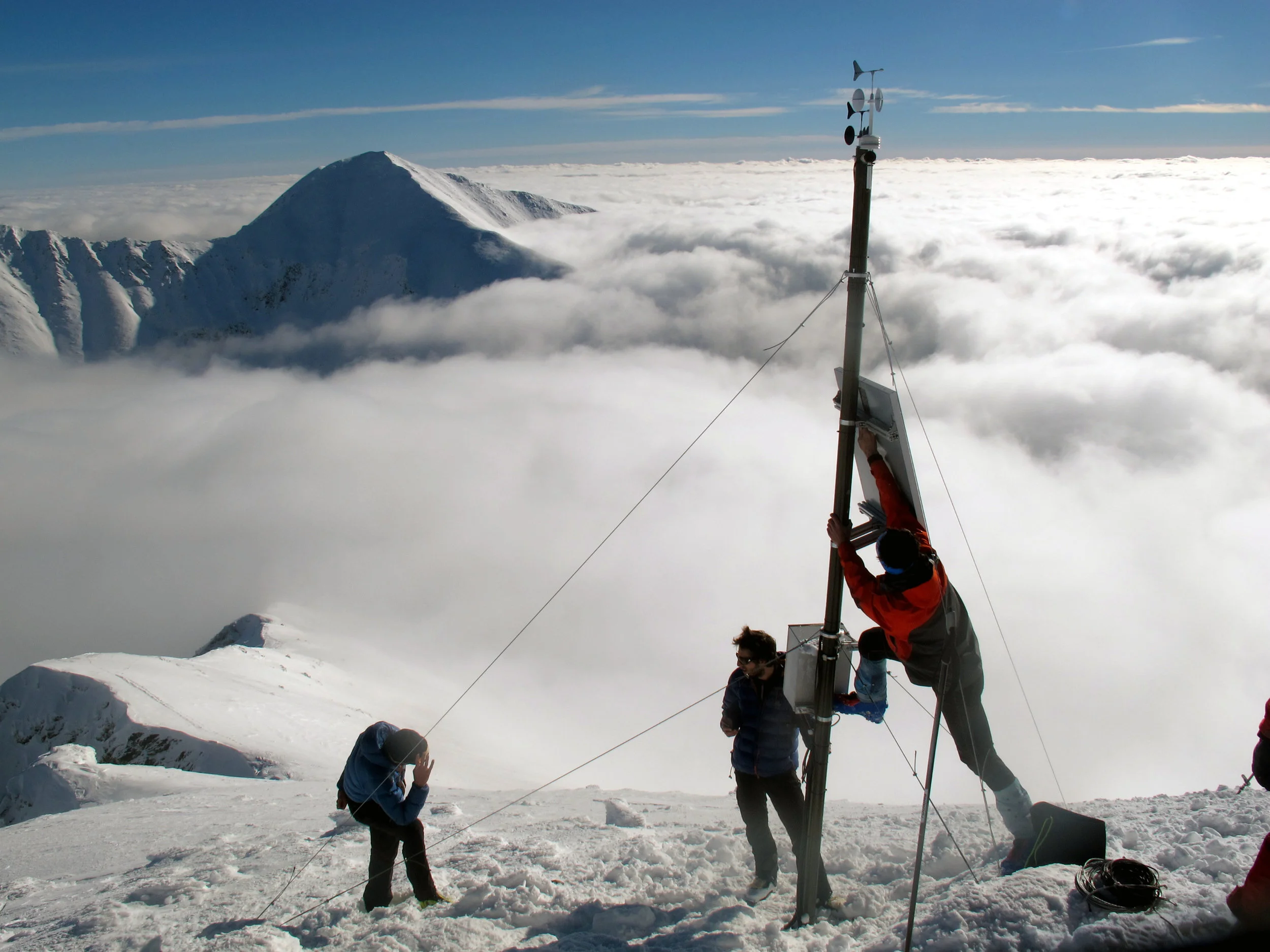 Avalanche rescue installing a winter weather station Barani Design