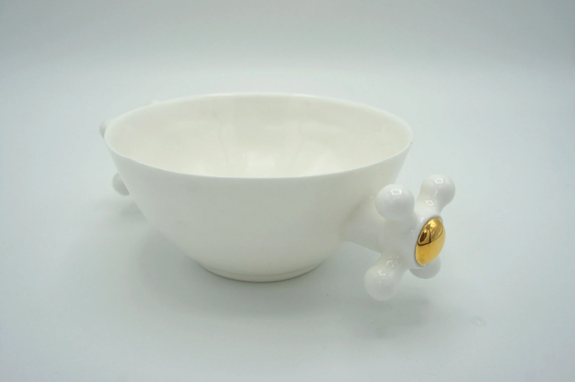 Two Faucets Cup - Eva Baron Interior Designer in Oxford