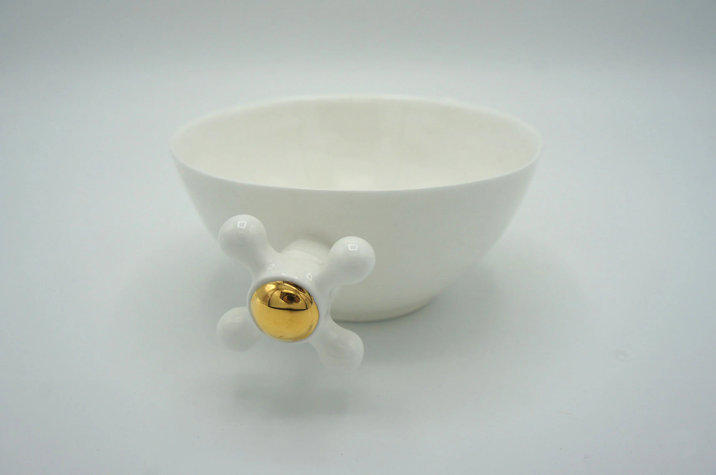 Two Faucets Cup - Eva Baron Interior Designer in Oxford