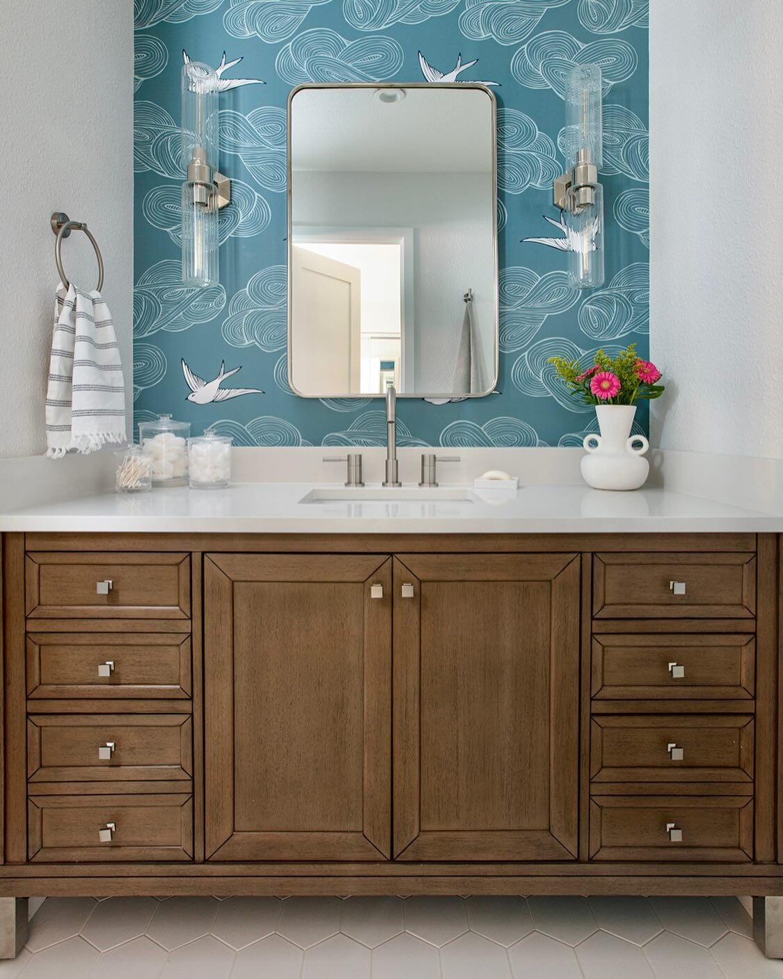 S P R I N G 🕊️ T I M E 

In honor of Springtime coming up, here&rsquo;s a cute little bathroom space where we had some fun with wallpaper 🤍 It was a perfect vanity niche wall that begged for something more than boring ol&rsquo; paint could ever do.