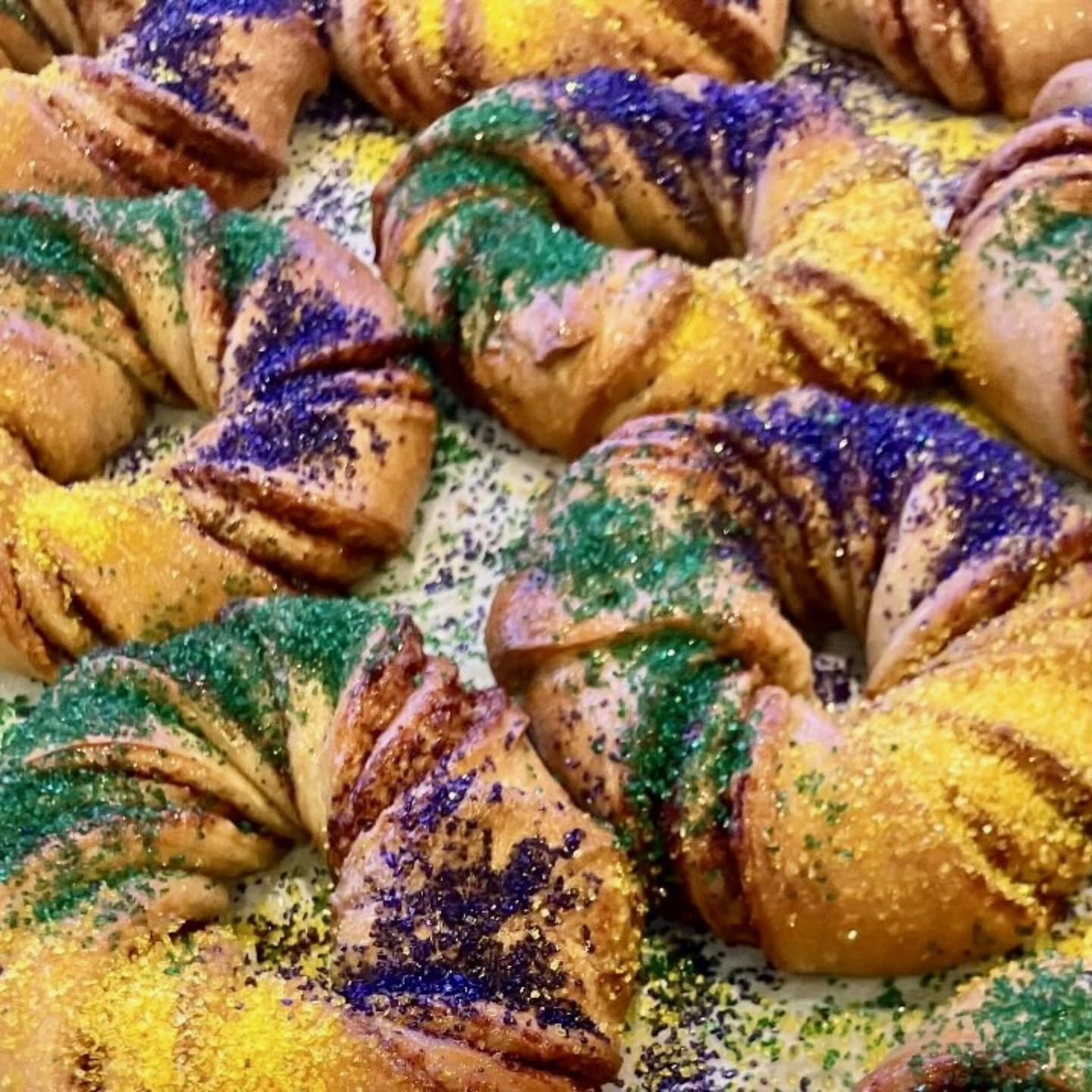KING CAKES ARE BACK FOR THE SEASON

Starting this week and running through  Feb 15 (aka the Sunday before Fat Tuesday), give yourself the royal treatment and grab one of our personal king cakes! They're twisted sweet dough with an orange-cinnamon fil