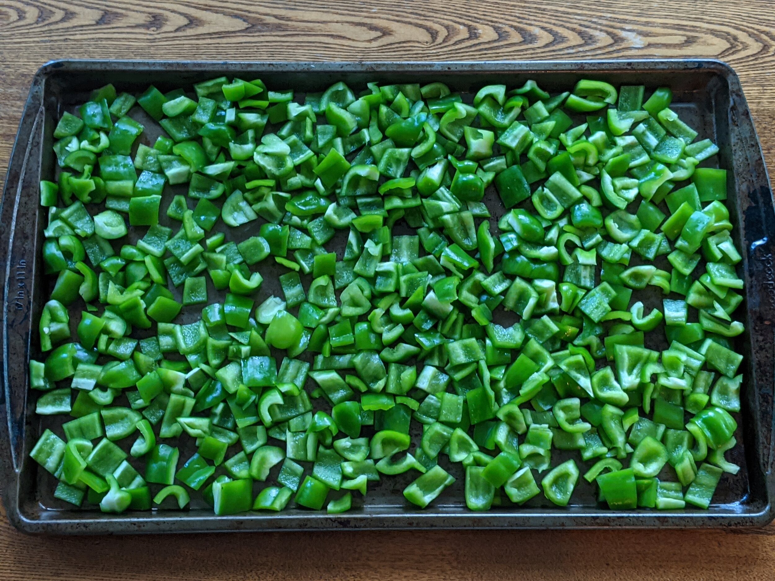 Step 3: Spread peppers on baking sheet.