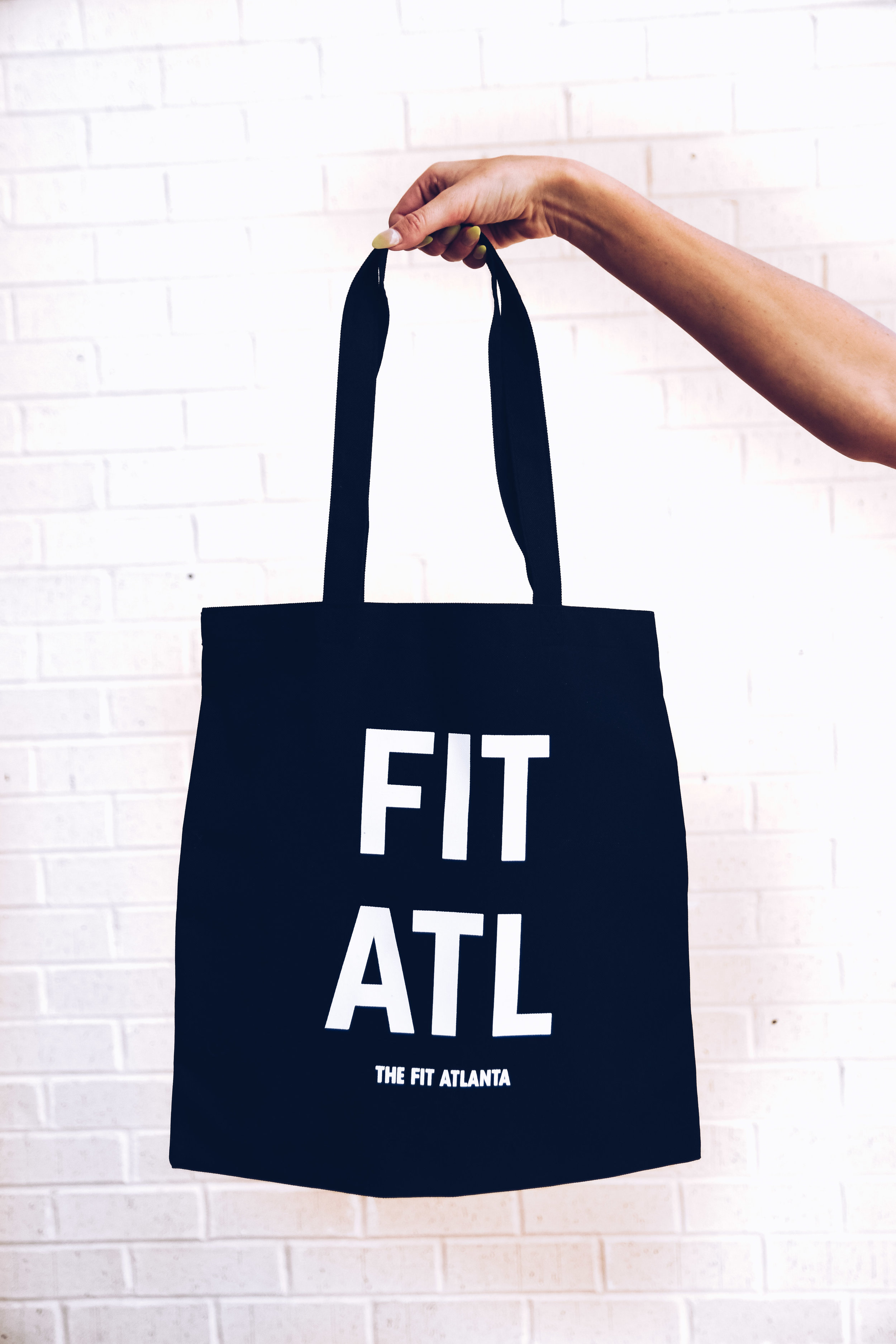 The Fit Atlanta Tote Our canvas tote bag is exactly what you need to take to the gym, use as a reusable shopping bag, or take to the pool. Preorder yours now!