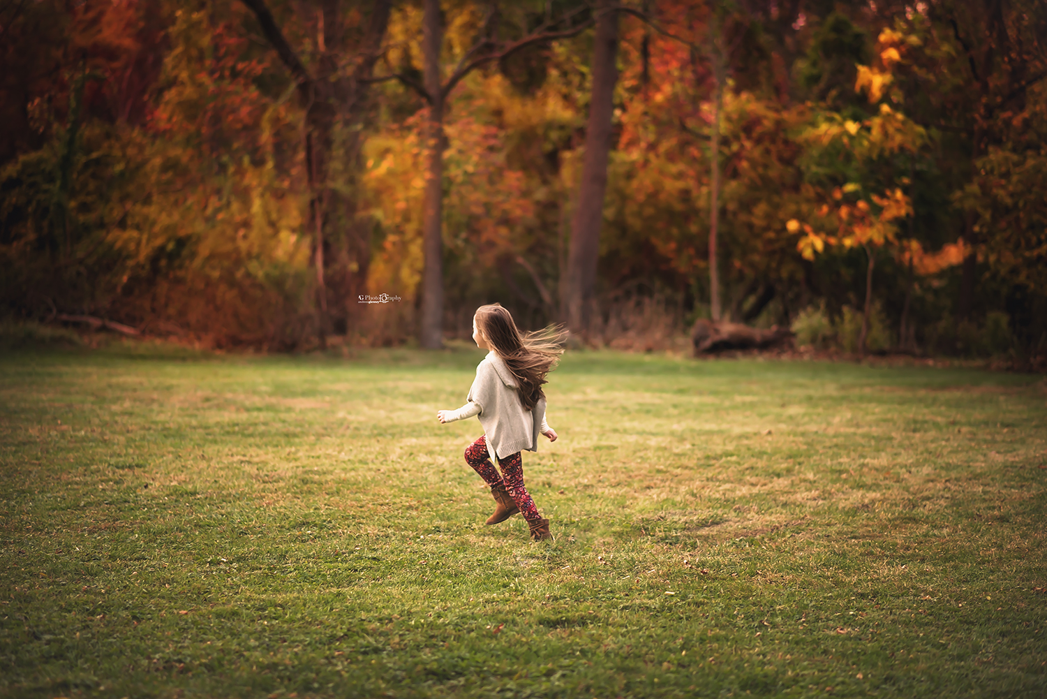 child-running-fall-background-Bergen-county-photoshoot.jpg