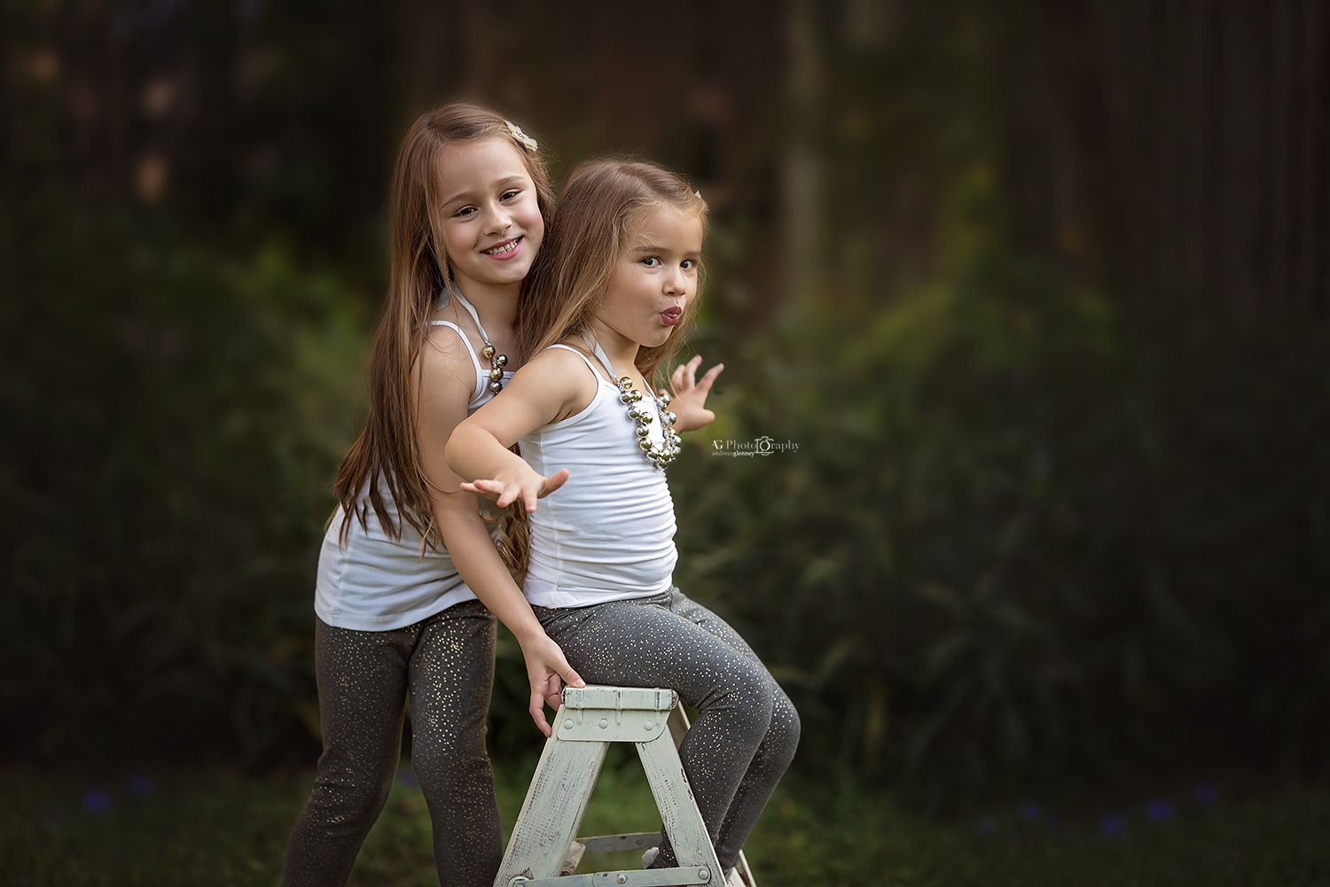 Girls-sisters-fun-session-green-background.jpg