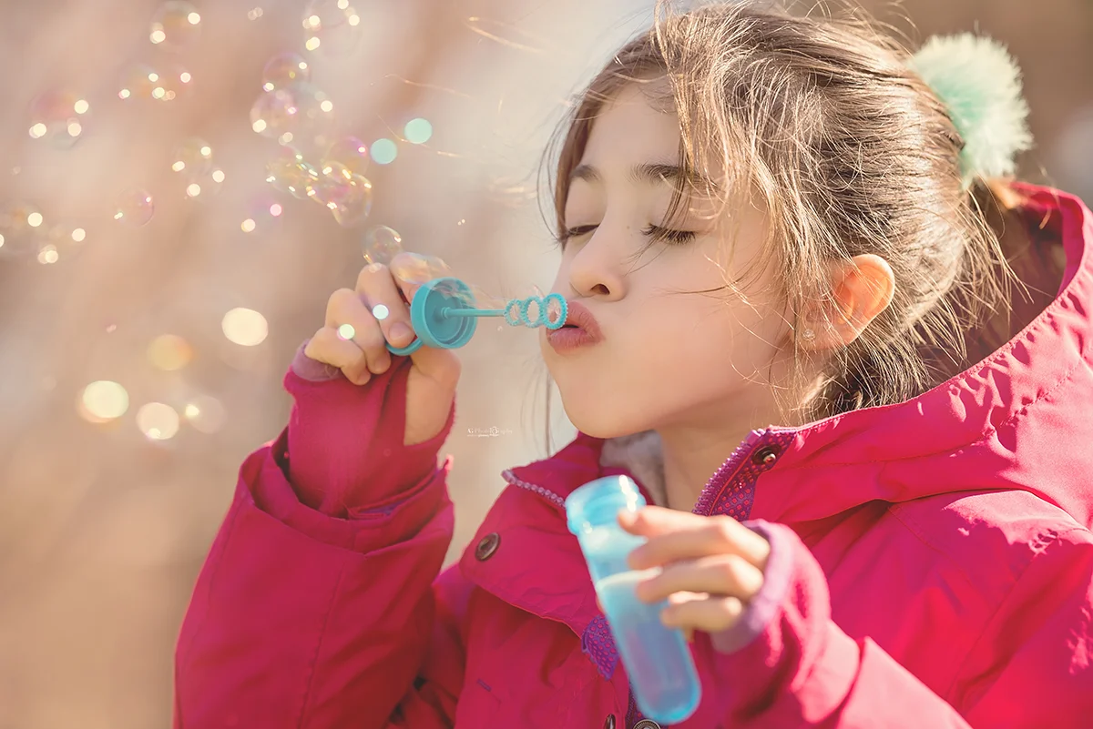 girl-bubble-fun-session-outdoor-photography.jpg