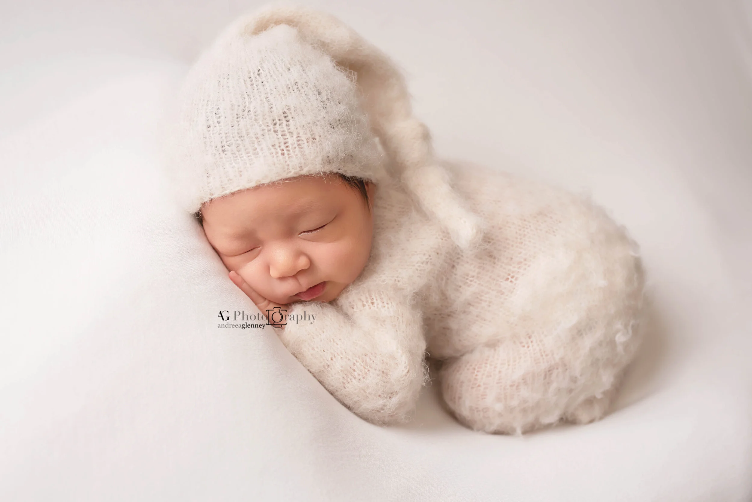 newborn-sleeping-white-outfit-NJ-studio.jpg