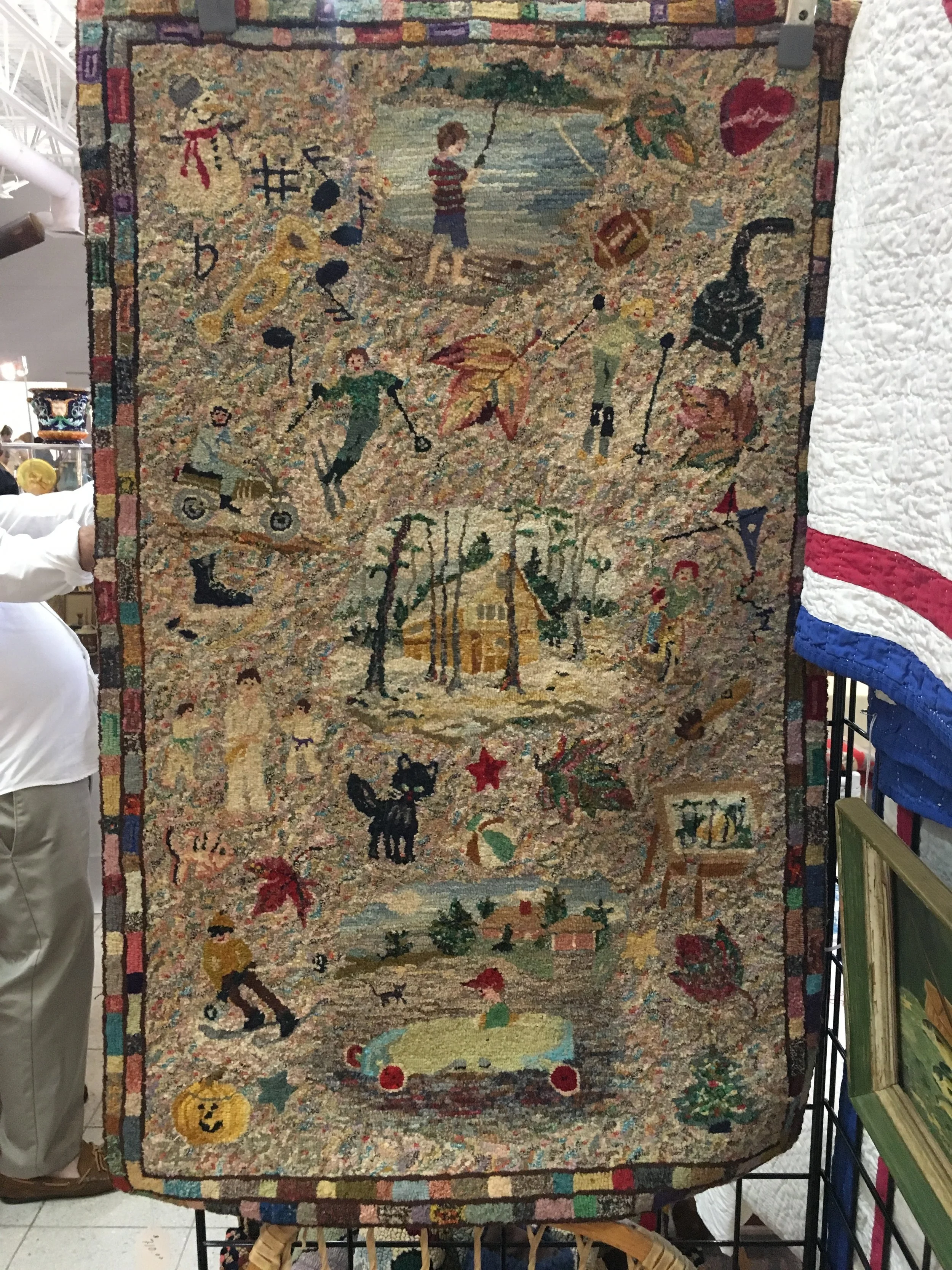  Fantastic hooked rug from the 1940's. &nbsp;Intricate detail of many childhood activities. 