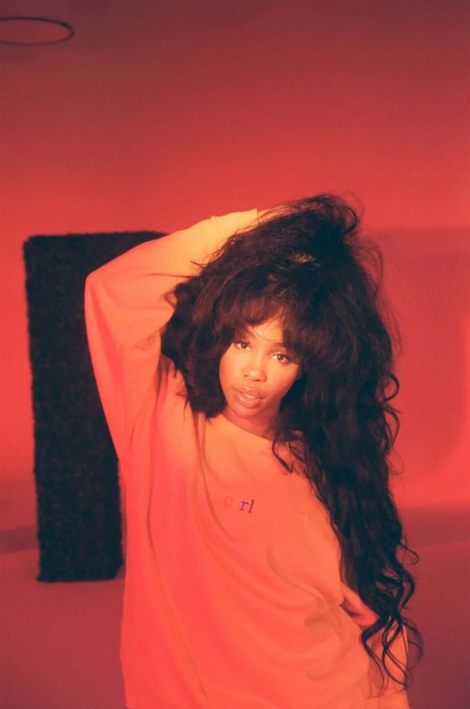 Photo via RCA Records and Top Dawg Entertainment (TDE).