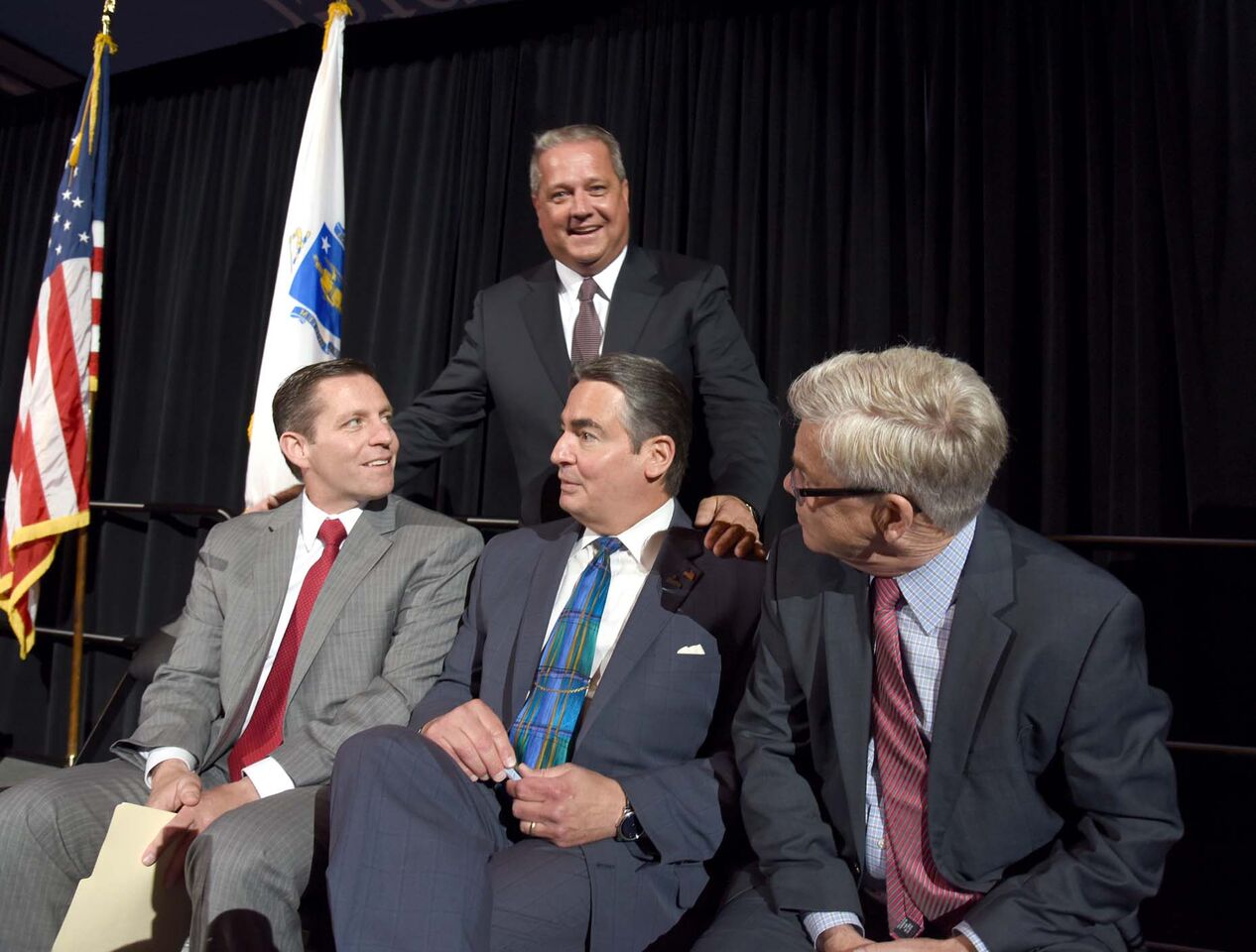 Dennis Murphy with (from left to right) Fred Peterson, Deputy Director of the Massachusetts Convention Center Authority, Springfield Mayor Domenic Sarno and David Andrews, President and CEO of the American Hockey League, at the unveiling of the Springfield Thunderbirds, the AHL affiliate of the Florida Panthers, at the MassMutual Center on June 15, 2016.