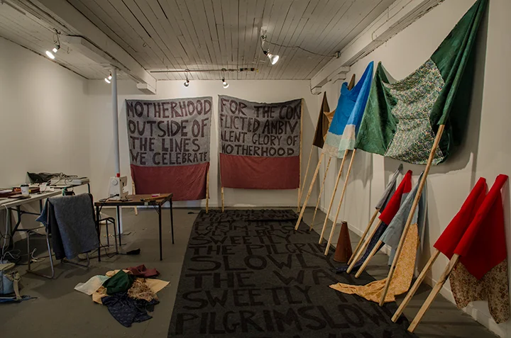 Studio at Struts and Faucet, Sackville, New Brunswick. Banners in preparation for Mothers March.