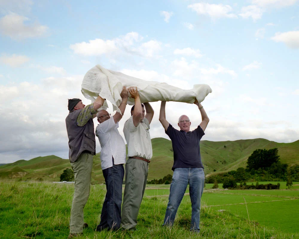 Aoteoroa or The long white cloud , performance at Mt. Bruce studios, 2008. This project was completed at New Pacific Studios in Mt. Bruce, New Zealand while I was in residence. The Maori name for New Zealand is Aotearoa, which means 'the long white cloud'. I became the long, white cloud and asked neighboring farmers to help lift me into the air. Thank you to Kay Flavell, director of NPS and the kind cloud lifters.
