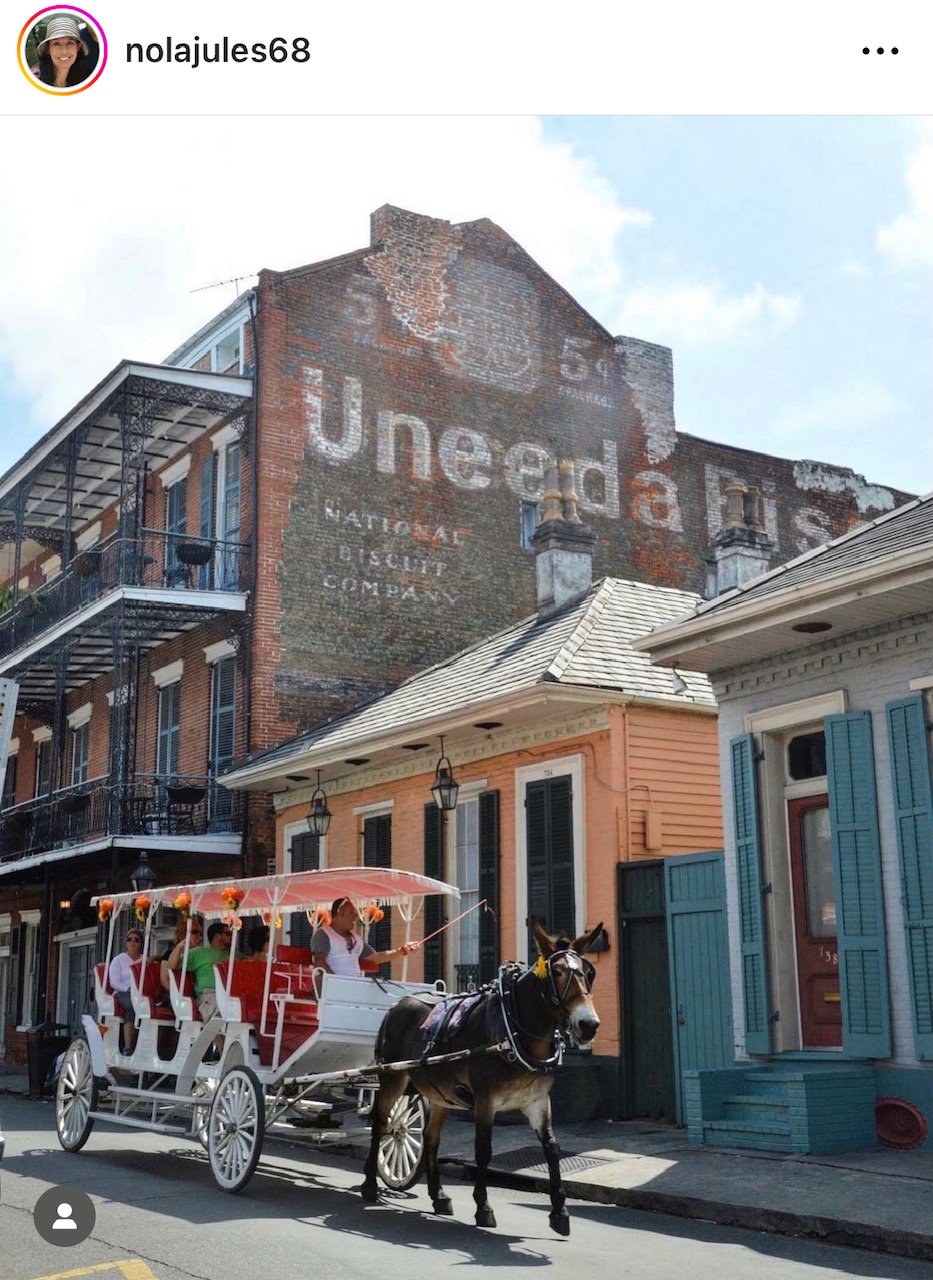 “Ghost Sign” Uneed a biscuit  French Quarter Mansion 