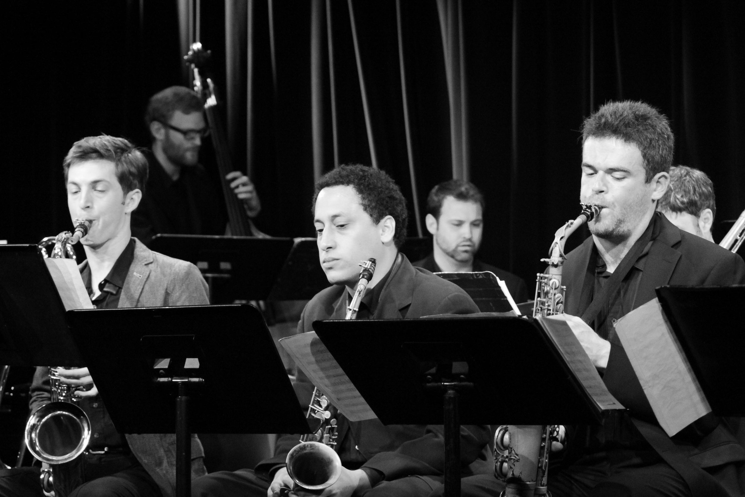 Doug Drewes, bass, Ryan Cavan, drums. Sam Taylor, tenor saxophone, Omar Daniels, alto saxophone, Andrew Gould, alto saxophone. David White Jazz Orchestra live in performance at Symphony Space. New York, NY. 2011. Photo by Donna Davis. 