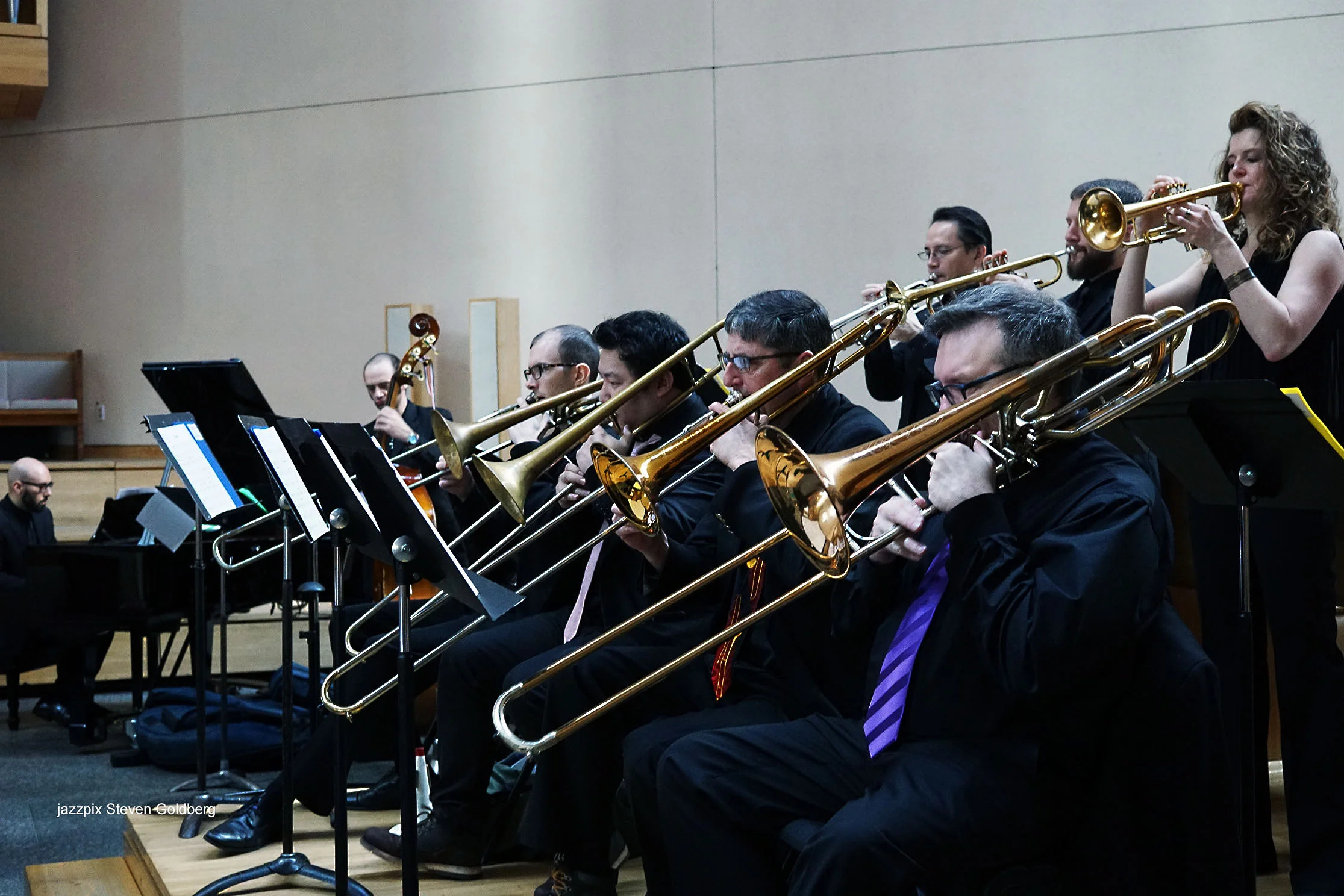  Colin Brigstocke, trumpet, Ron Harter, trumpet, Alicia Rau, trumpet. James Hall, trombone, Jimmy O'Connell, trombone, Robert Stattel, trombone, Brandon Moodie, bass trombone. Angelo DiLoreto, piano, Alexi David, bass. David White Jazz Orchestra. Liv