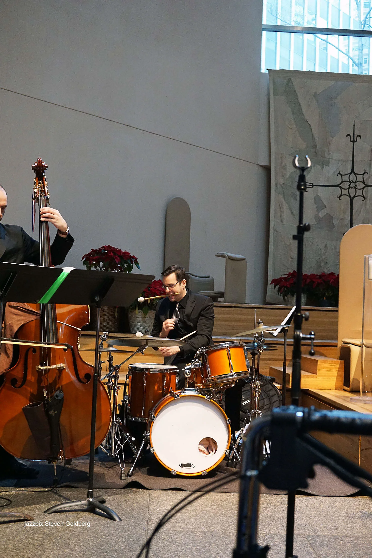 Alexi David, bass, Jordan Young, drums. David White Jazz Orchestra. Live at Midday Jazz CD Release concert at Saint Peter's Church, New York, NY. 2017. Photo by Steven Goldberg.   