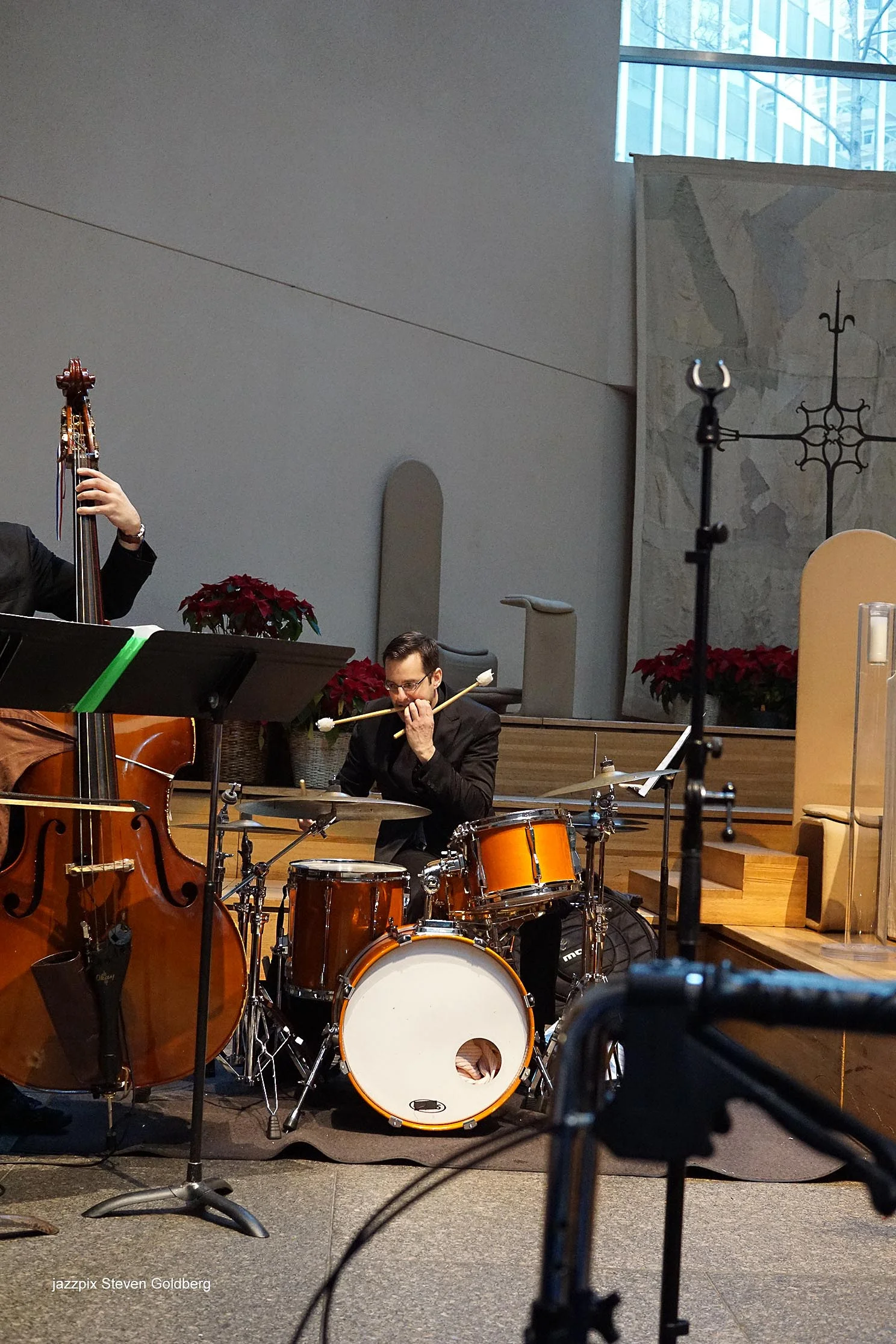 Alexi David, bass, Jordan Young, drums. David White Jazz Orchestra. Live at Midday Jazz CD Release concert at Saint Peter's Church, New York, NY. 2017. Photo by Steven Goldberg.   
