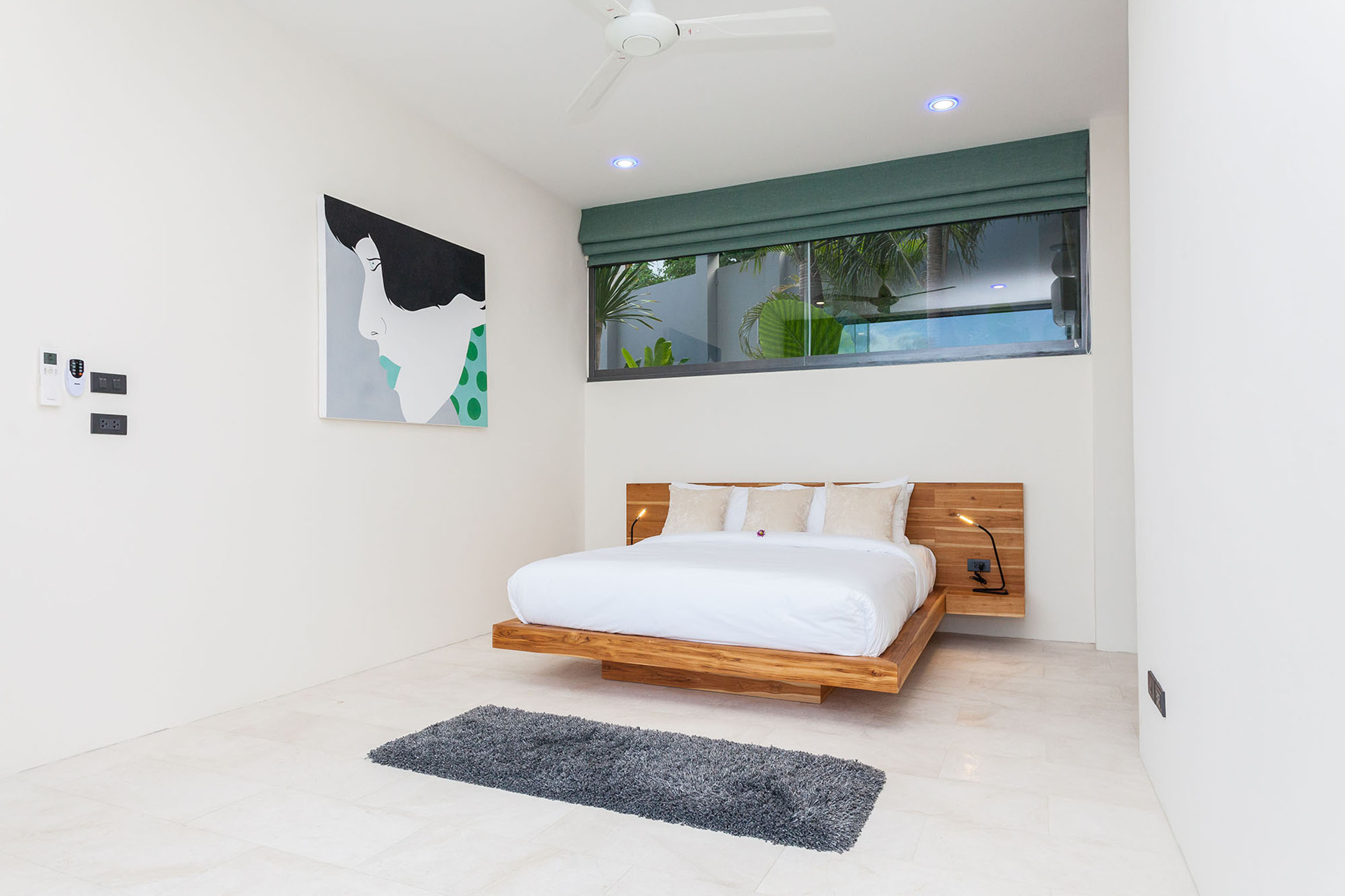 Bedroom with wooden king-size bed