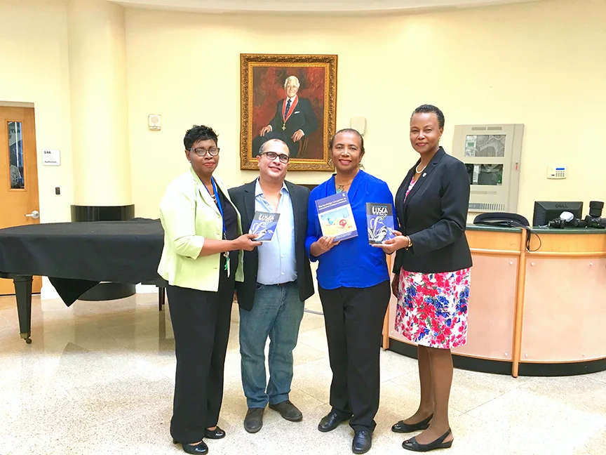 (l to r) Bertha-Mae Walker, PhD, university librarian, University of The Bahamas; Neko Meicholas, publisher Guanima Press Ltd; Patricia Glinton-Meicholas and Linda Davis, PhD, provost, University of The Bahamas. 