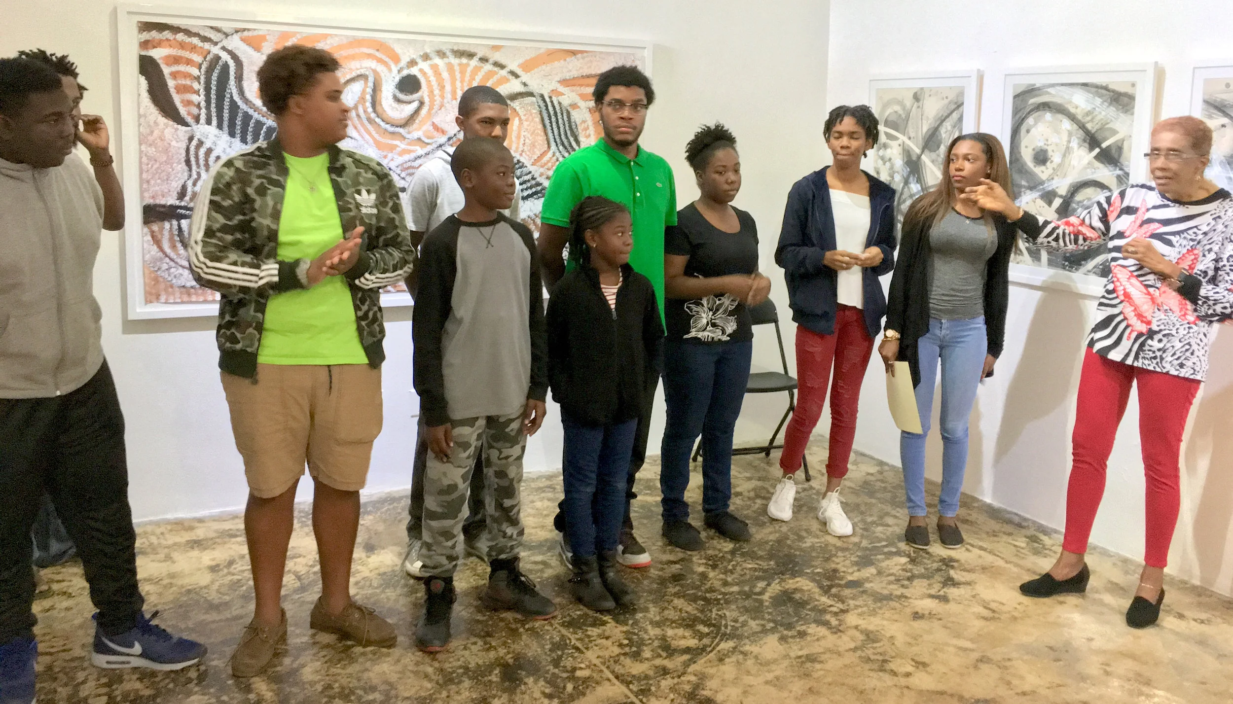 Students of the TARA Xavier Hepburn Foundation take a bow after performing Patricia Glinton-Meicholas' work "The Importance of Christmas Dinner" and "The Boy, The Magic Drum and the Dancing Witch". (Right) Claire Hepburn, Co-Founder the TARA Xavier Hepburn Foundation.