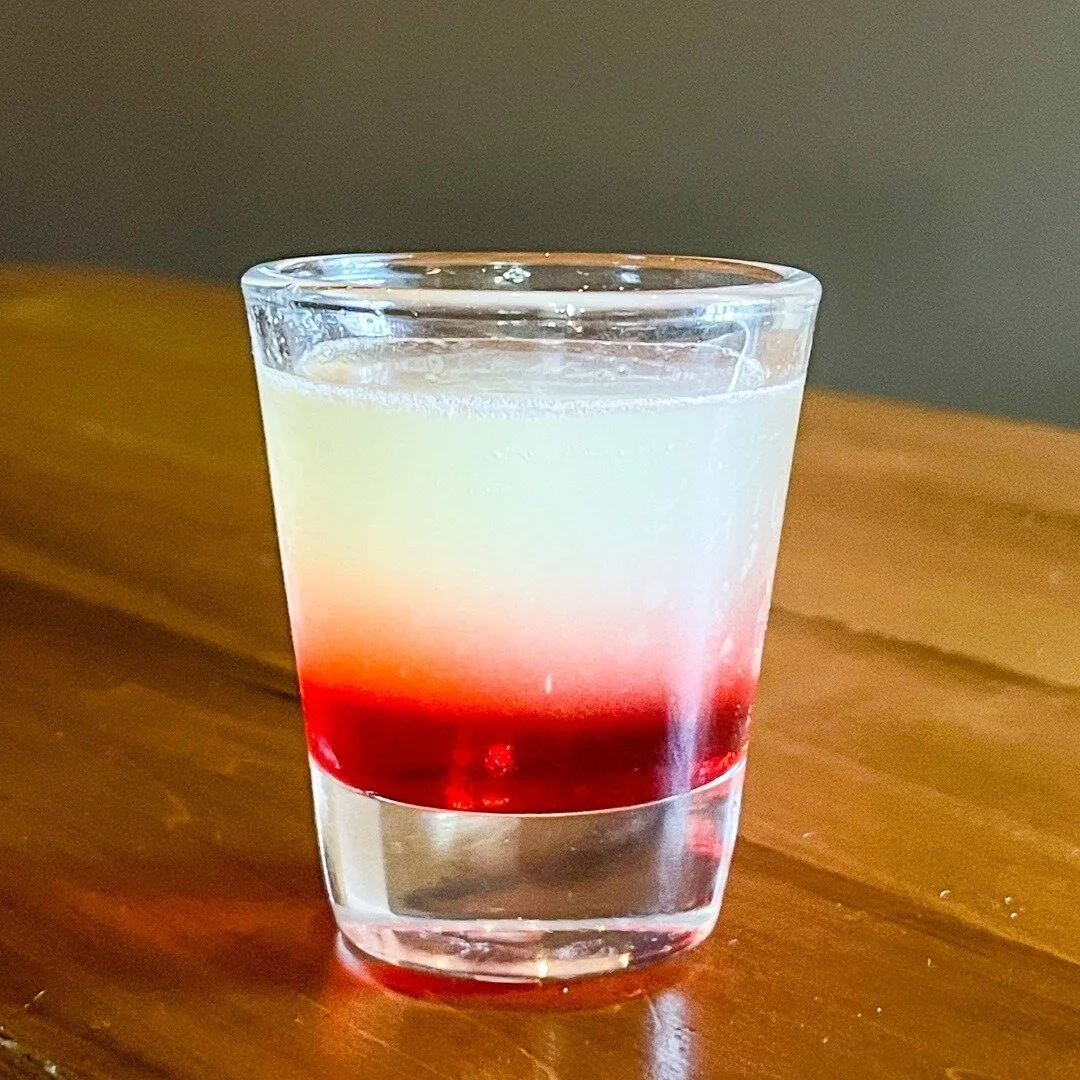 Venture to the upside down&hellip;No, not that place😳, we&rsquo;re talking about our Pineapple Upside Down Cake shot.🍍 We layer vodka, pineapple juice and grenadine to make this beautiful, fruity creation. Stop in to try one&hellip;if you dare! 

#