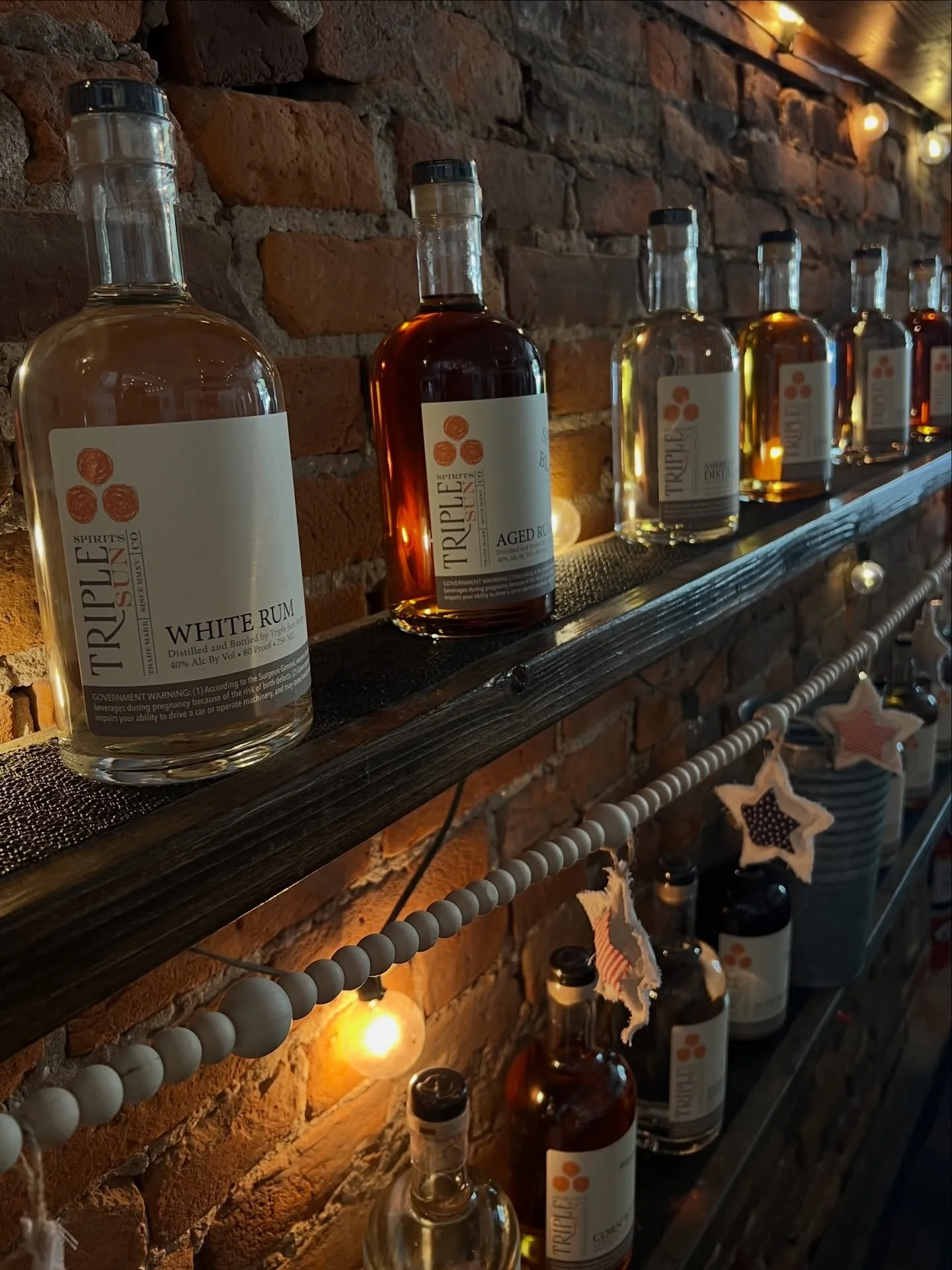 Joy ☀️ in a bottle ☀️ on the shelf ☀️ behind the bar ☀️ at the tasting room ☀️ ready for your festivities