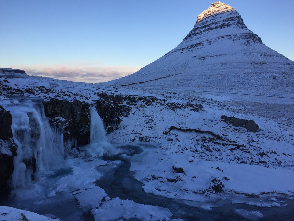 Frozen falls with mountain.JPG