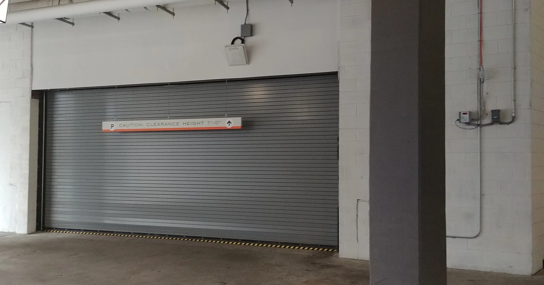 The column to the right, behind, will have the box to scan your keyfob!
