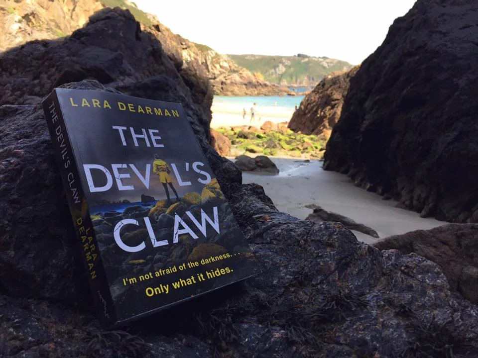 3. The Devil’s Claw Comes Home The Devil’s Claw is set on Guernsey, the island where I was born and raised. I left in 2000 to go to University on ’the mainland' never expecting that over the following seventeen years I would live in London, Paris, Singapore and New York. I love to travel, and to experience new places, but will always be a Guernsey girl at heart. When I started to write, I had no set idea as to genre, or plot, but the location was always going to be Guernsey. And it is the perfect setting for a crime thriller - breathtaking scenery, a unique culture, an abundance of legends and folktales and a complicated history, including five years spent under Nazi Occupation during the Second World War - all of which I have tried to capture in The Devil’s Claw. I went back this summer (as I have every year since I left) armed with proof copies of the book and really felt like it was bringing it home. Here it is, in the shadows on my favourite beach, Petit Bot.