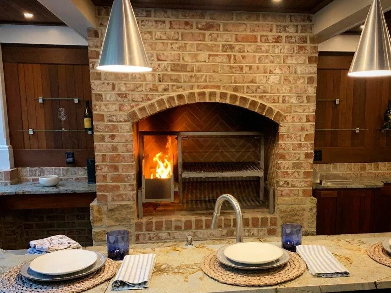 Grill fired up. Dinner soon to follow. Enjoy the cooking.  Enjoy the meal. 
.
.
.
#gauchogrills #grillthisway #premiumgrill #outdoorkitchenideas #argentinegrill